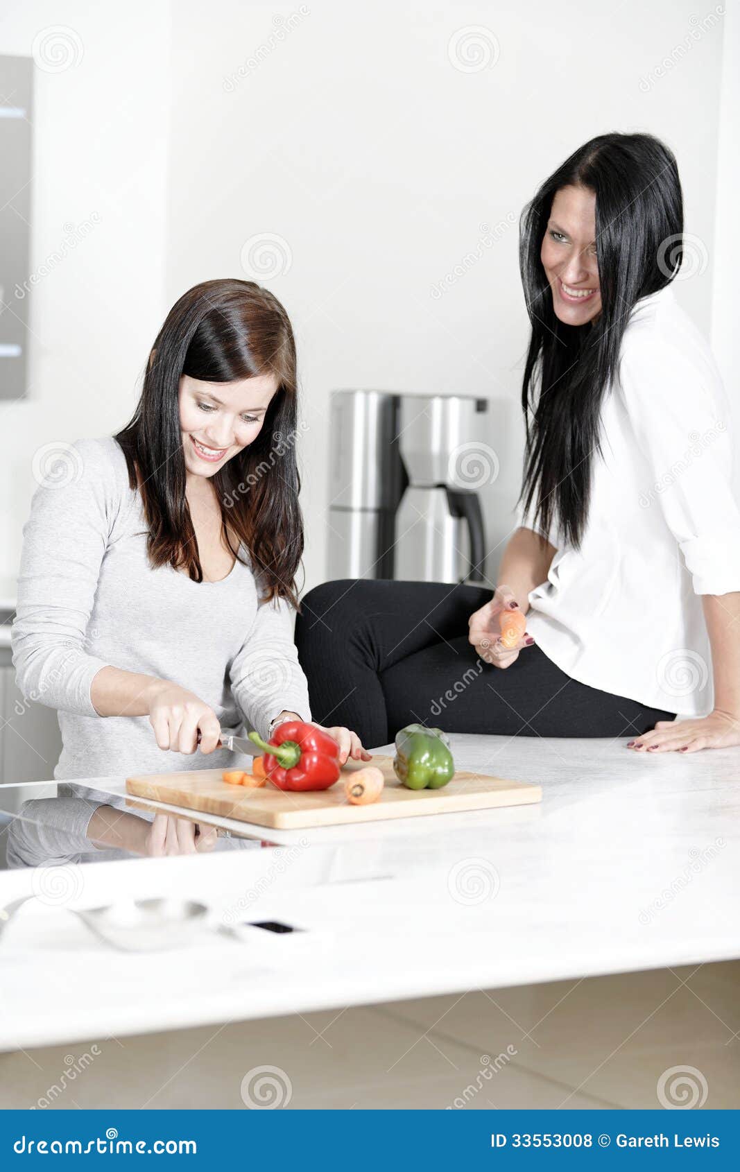 Two Friends Cooking Together Stock Photo - Image of kitchen, recipe