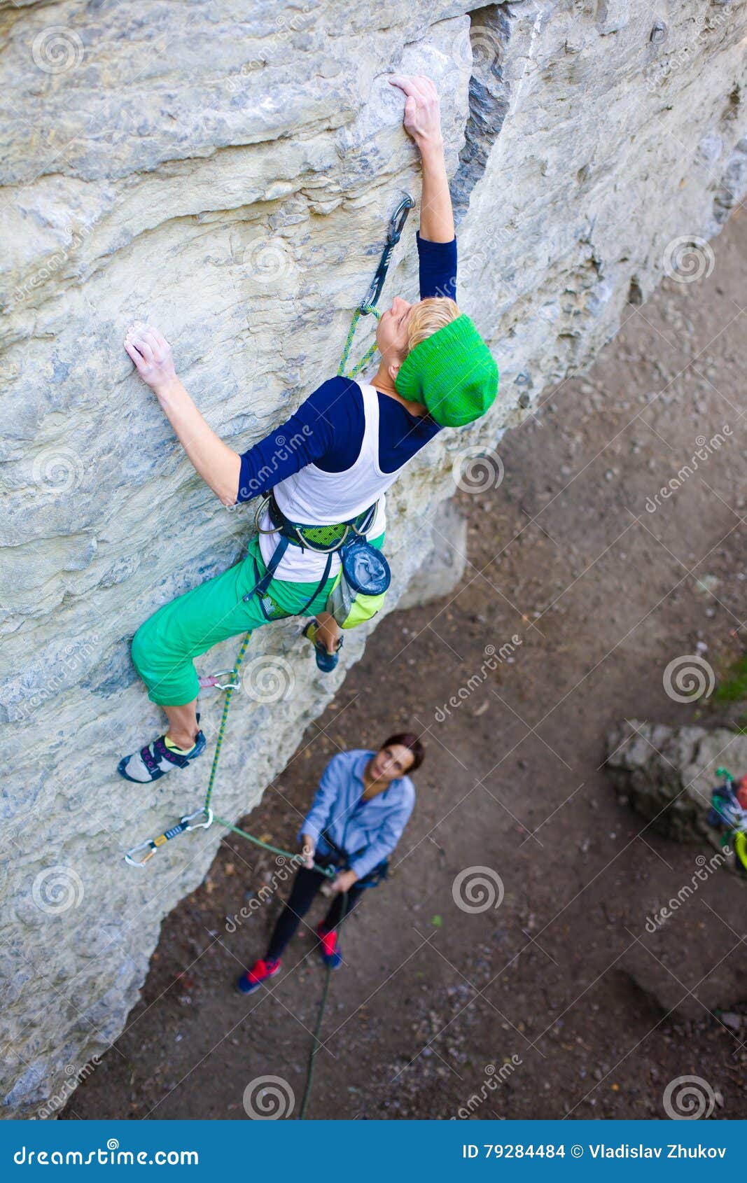 Two Friends Have Been Climbing on the Rocks. Stock Photo Image of