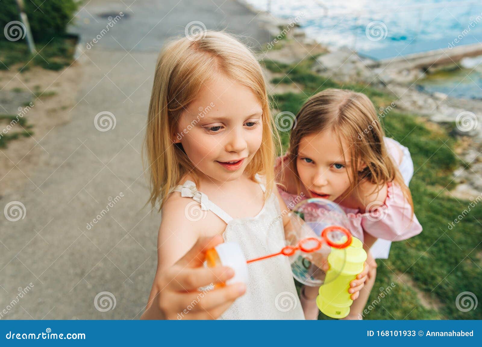 Outdoor Portrait Of Two Sweet Little Girls Stock Image Image Of Happy