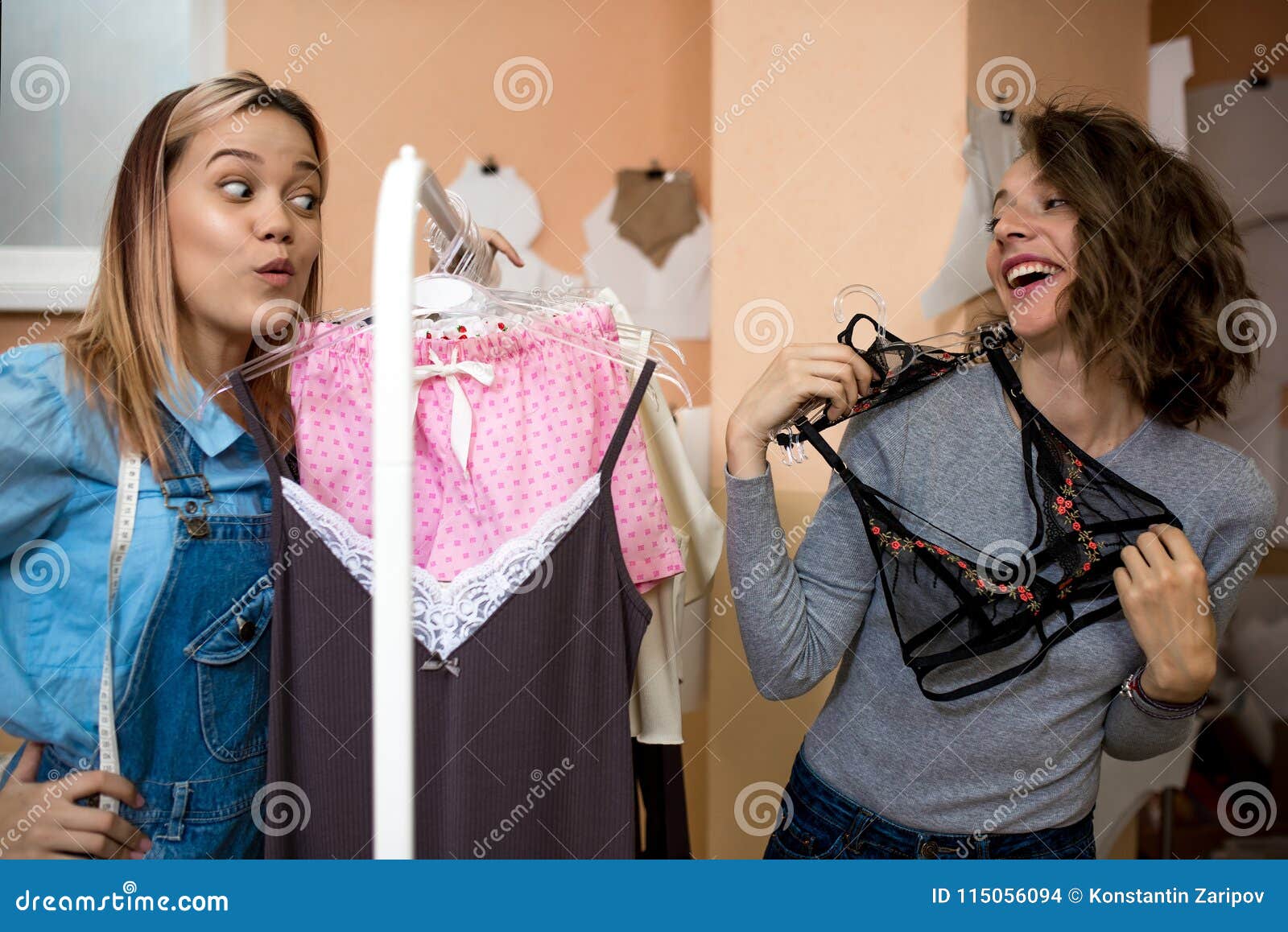 Two Funny Girls Try on Bras in Showroom Stock Photo - Image of laughter,  admire: 115056094