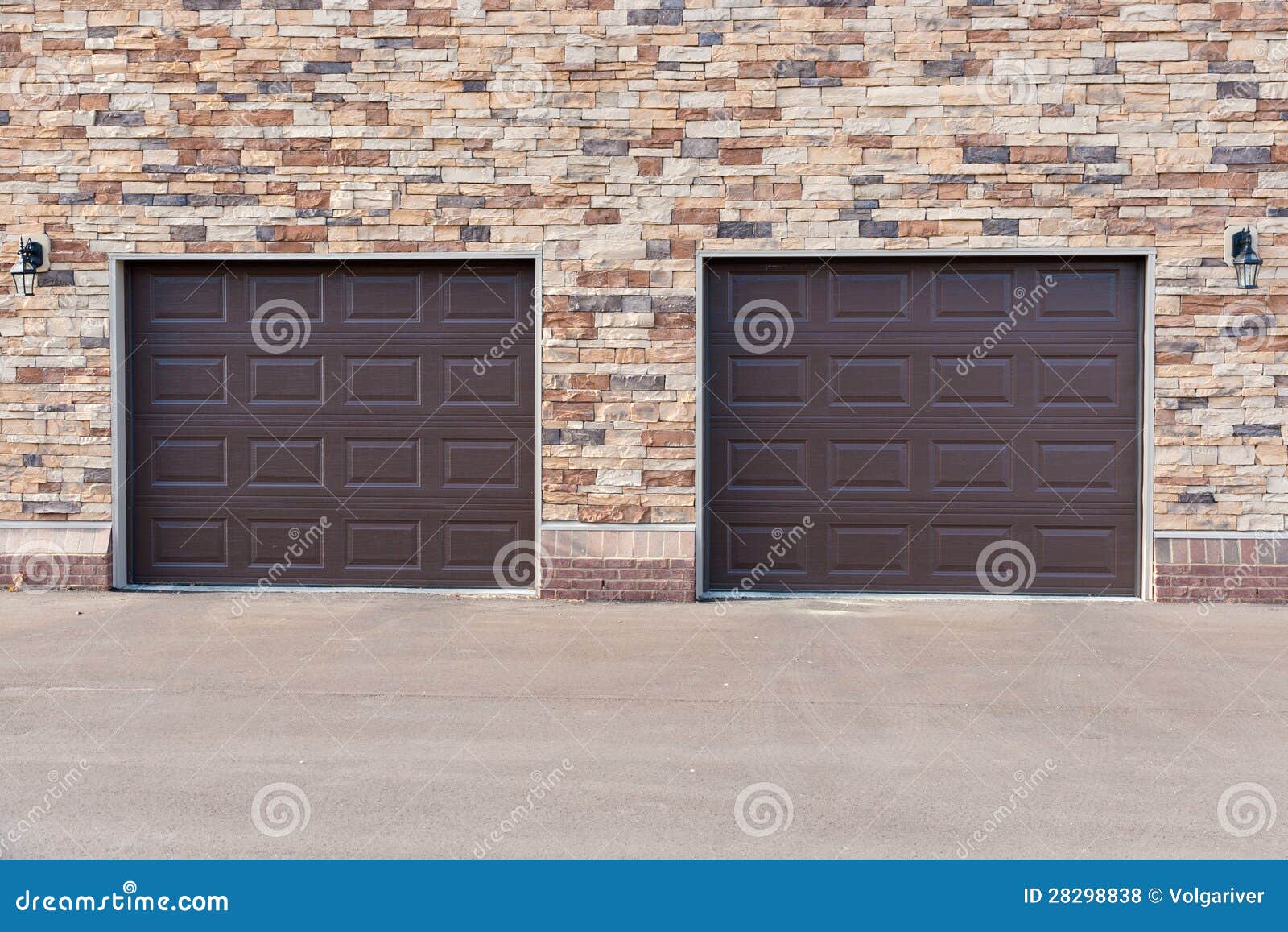 Two Garage Doors on Brick Wall. Stock Photo Image of ontemporary