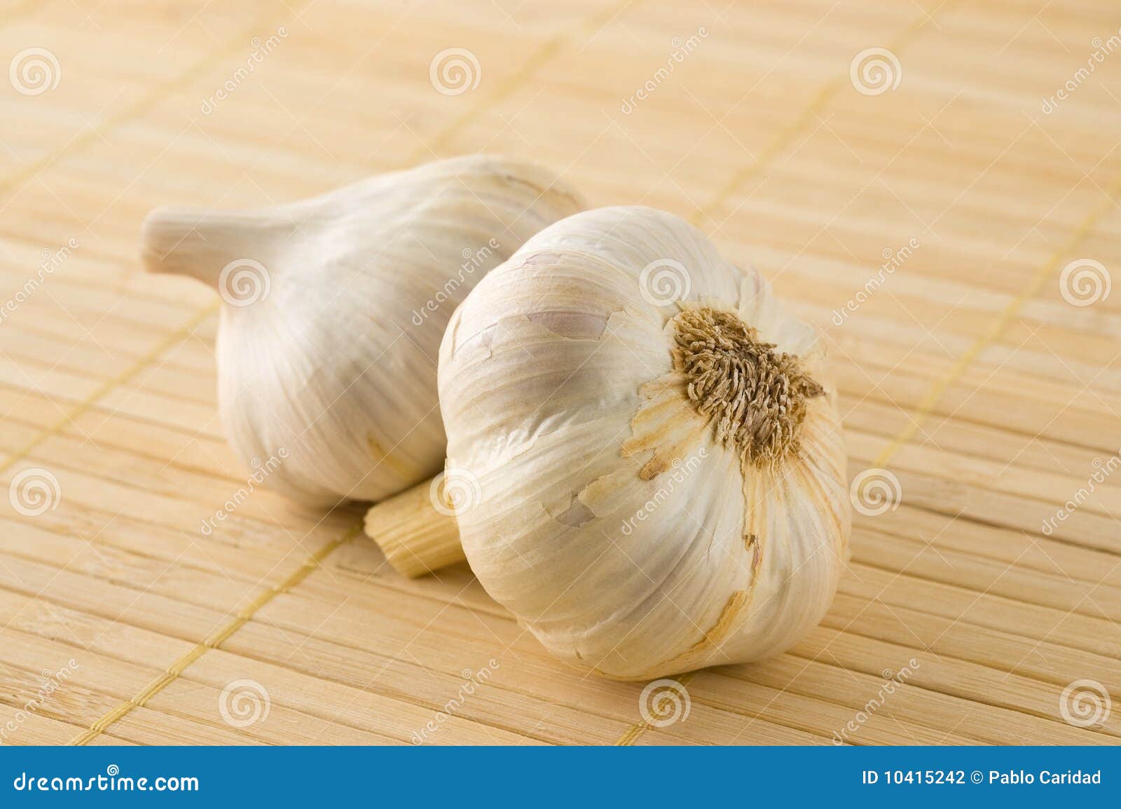 Two garlic heads. stock photo. Image of condiment, nutrition 10415242