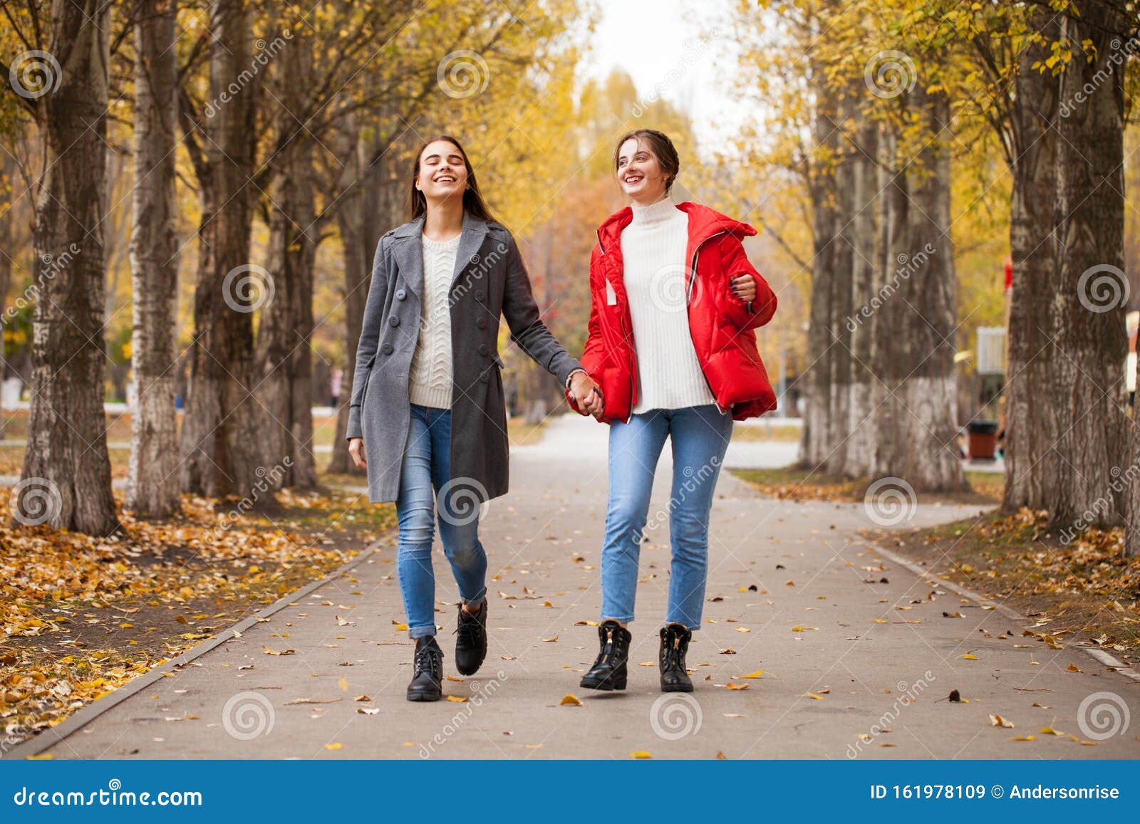 Two Girlfriends in a Gray Wool Coat and a Red Down Jacket Stock Image ...