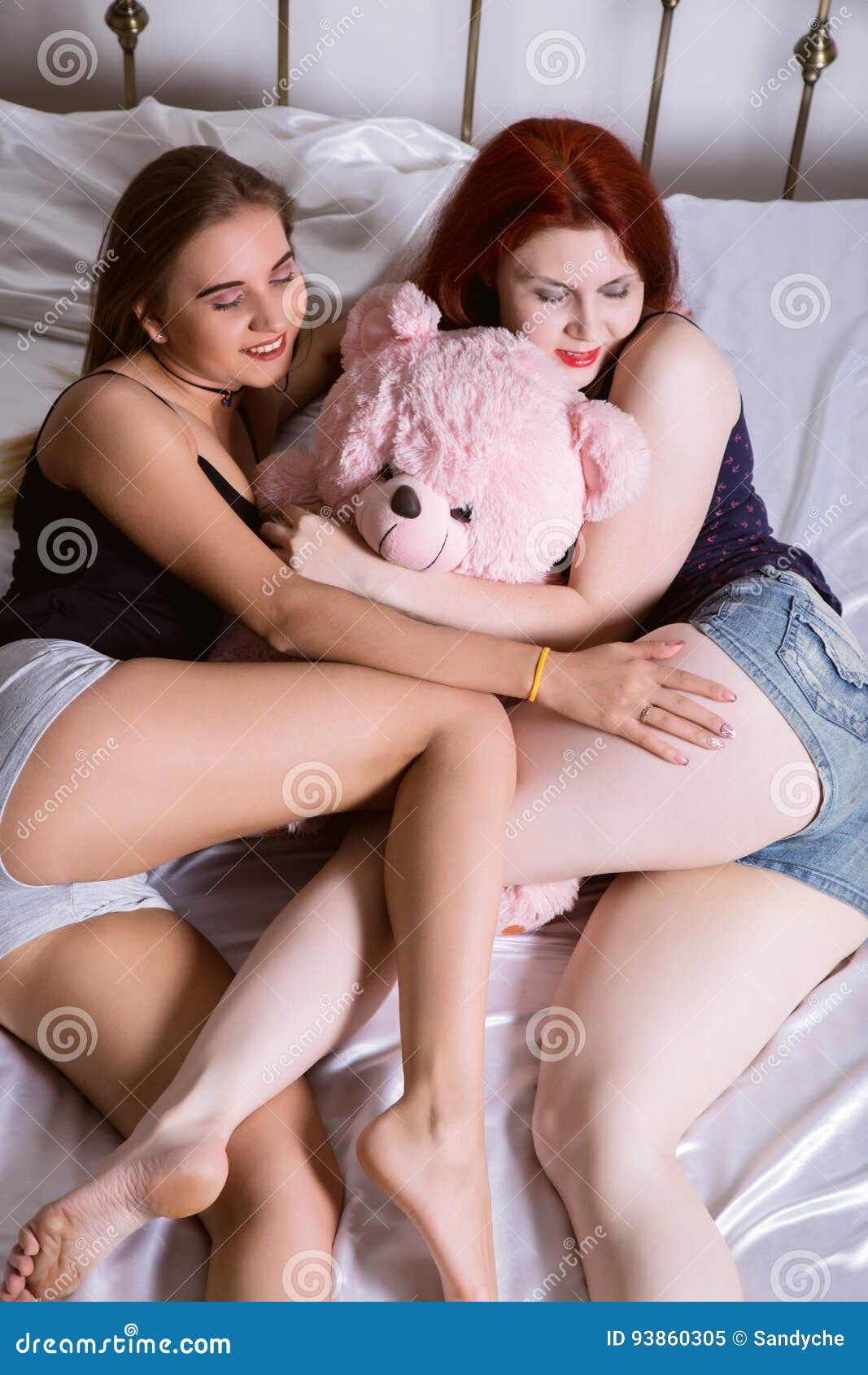 Girls Kissing On Beds