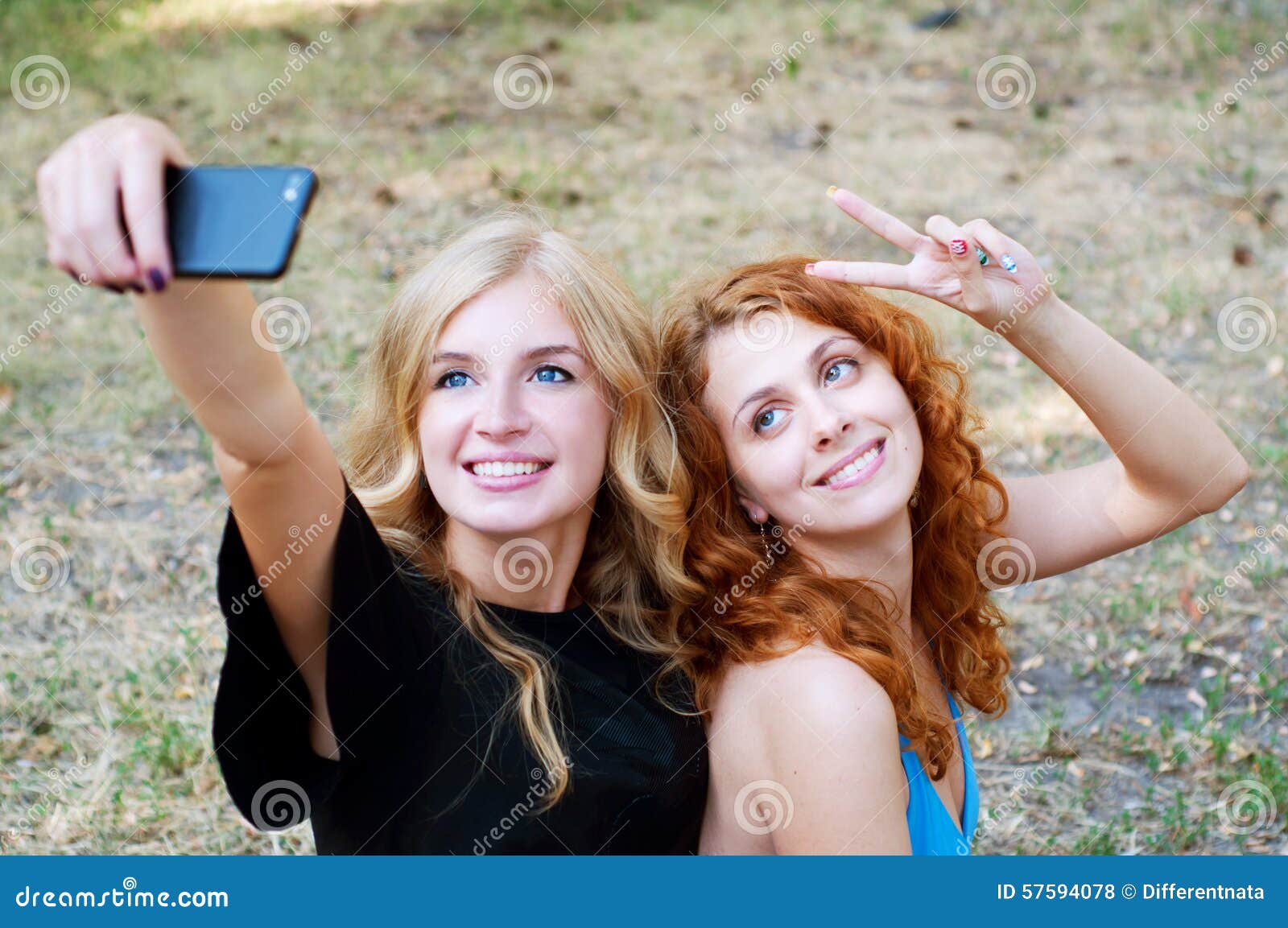 Two Girlfriends Taking A Selfie Stock Photo - Image: 57594078