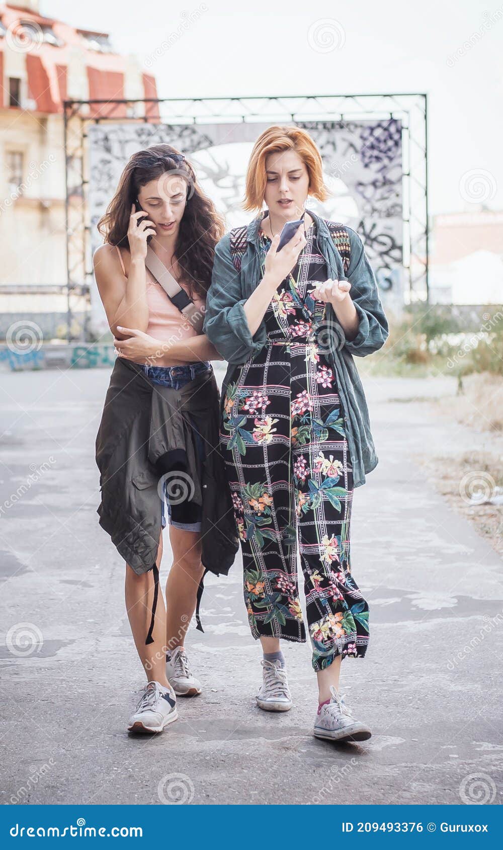 two girlfriends using smartphone connect communication. emotional isolation, technology depresion