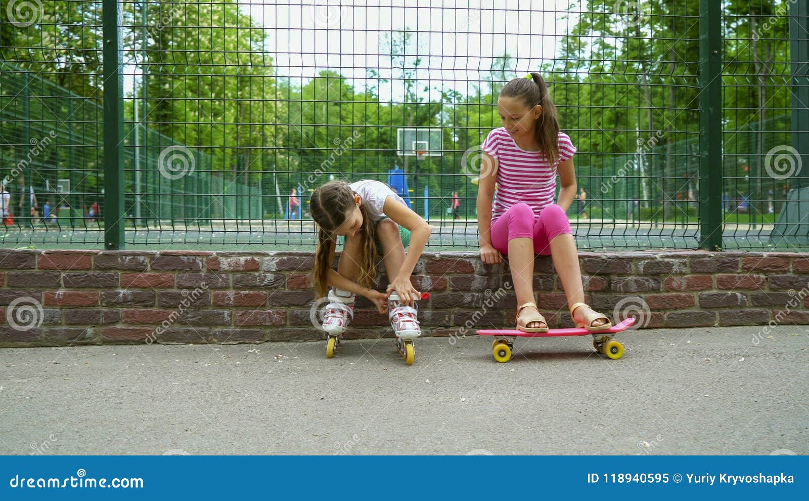 two girls active passtime in park