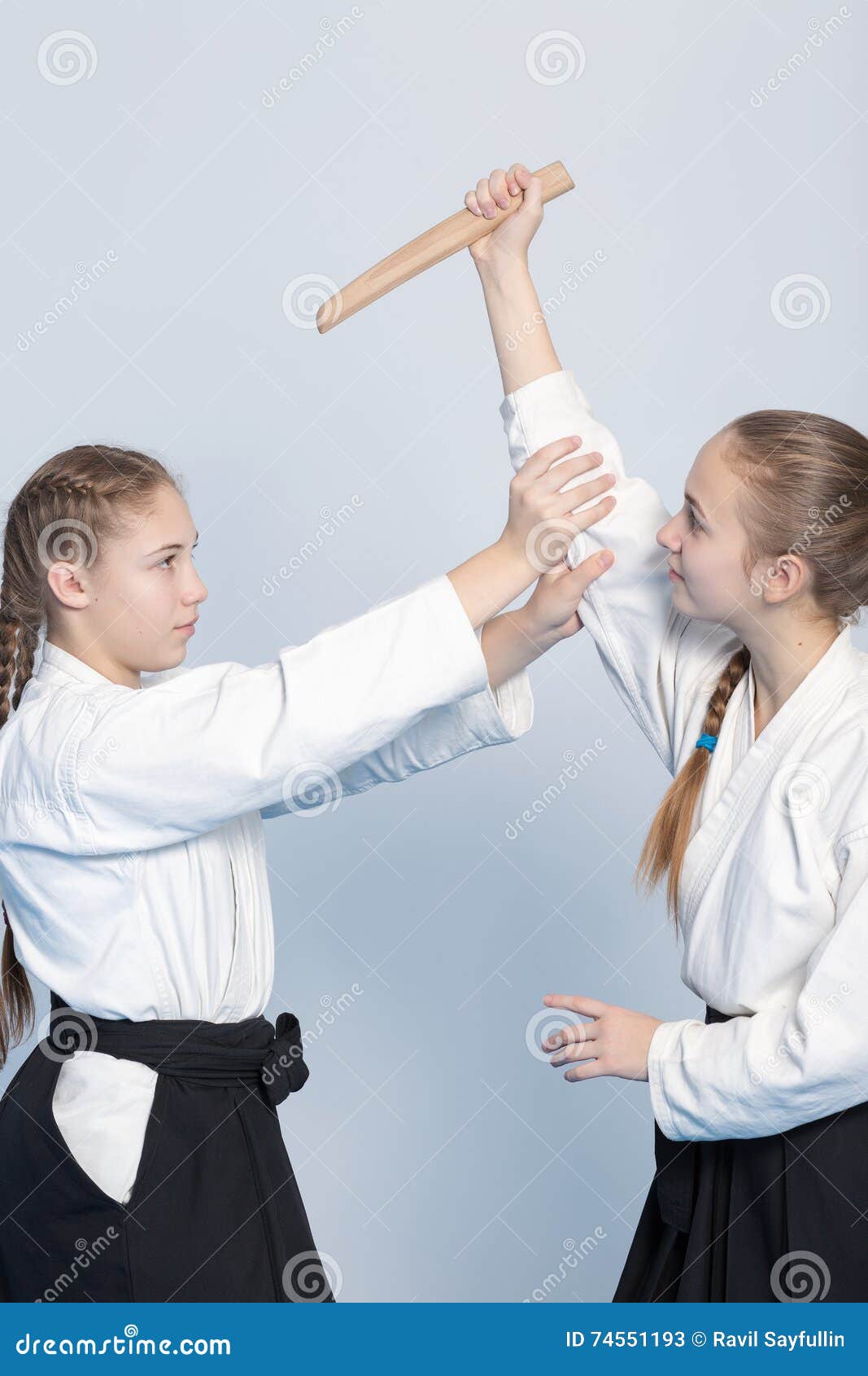 Two Girls Practice With Knife Tanto On Aikido Martial Arts Training On  White Background Stock Photo, Picture and Royalty Free Image. Image  51923963.