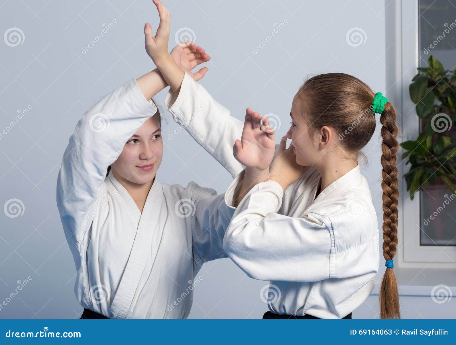 Two Girls in Black Hakama Practice Aikido Stock Image Image of coach