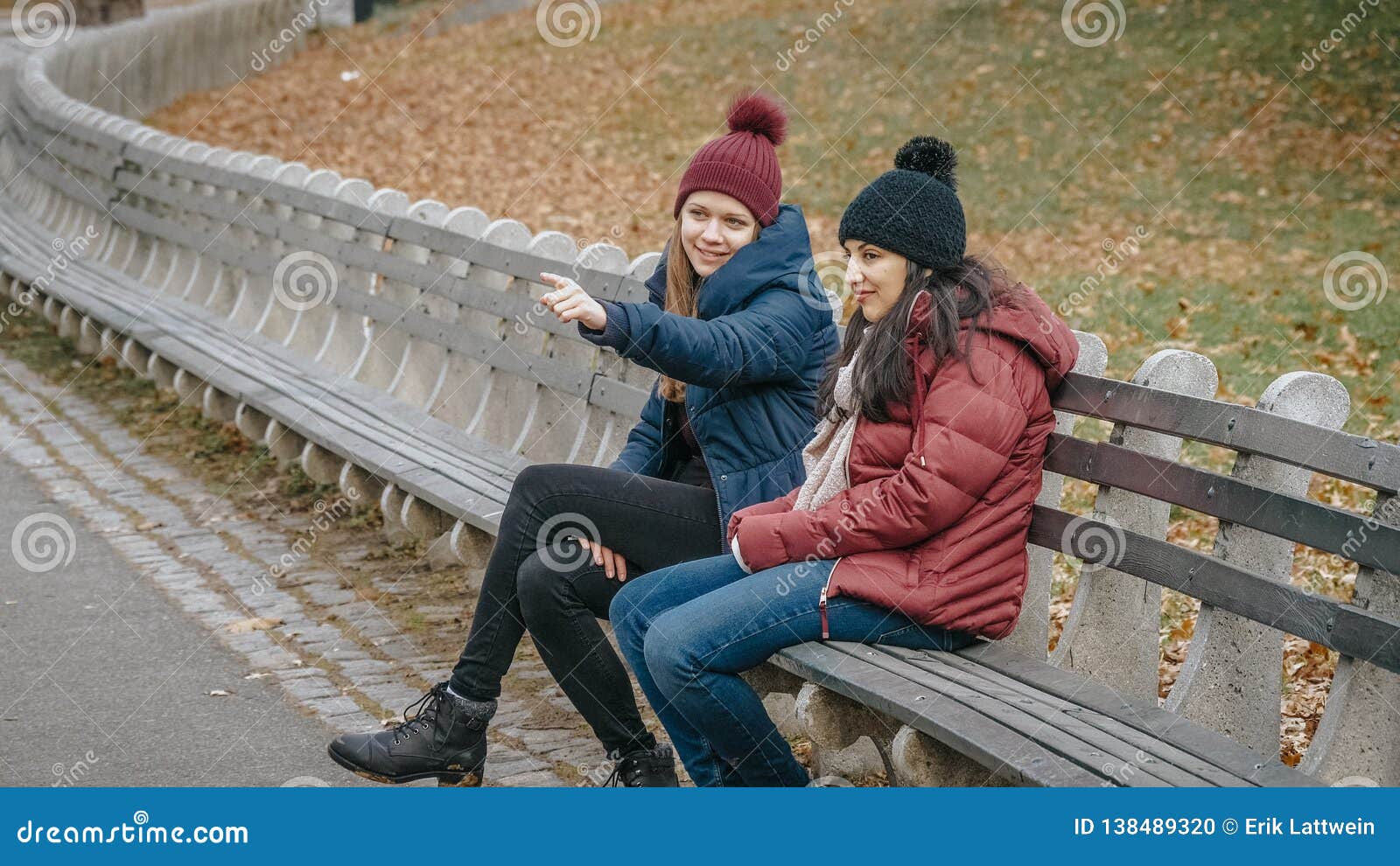 Two Girls in Central Park New York Sit on a Bench To Relax Stock Photo ...