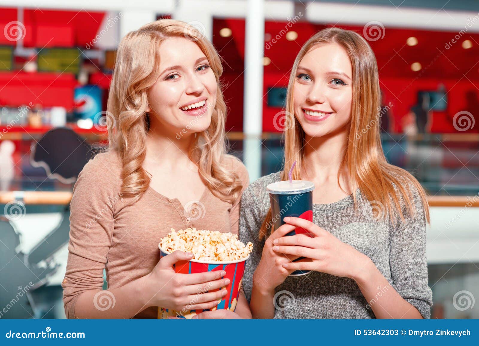 two-girls-coke-popcorn-earnest-glance-pr