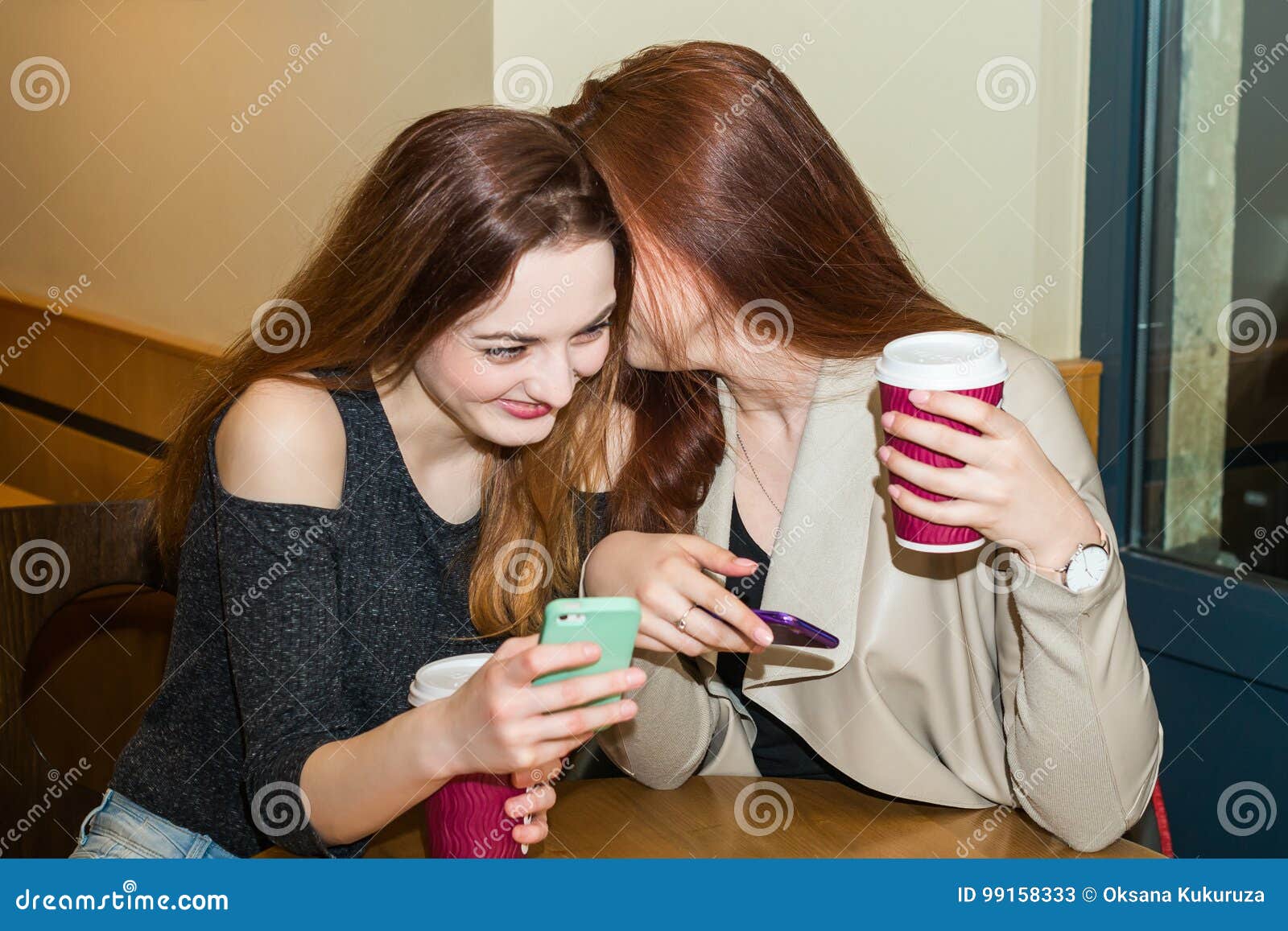 Two Girls Gossiping in a Cafe Bar Stock Image - Image of cheerful, girl ...