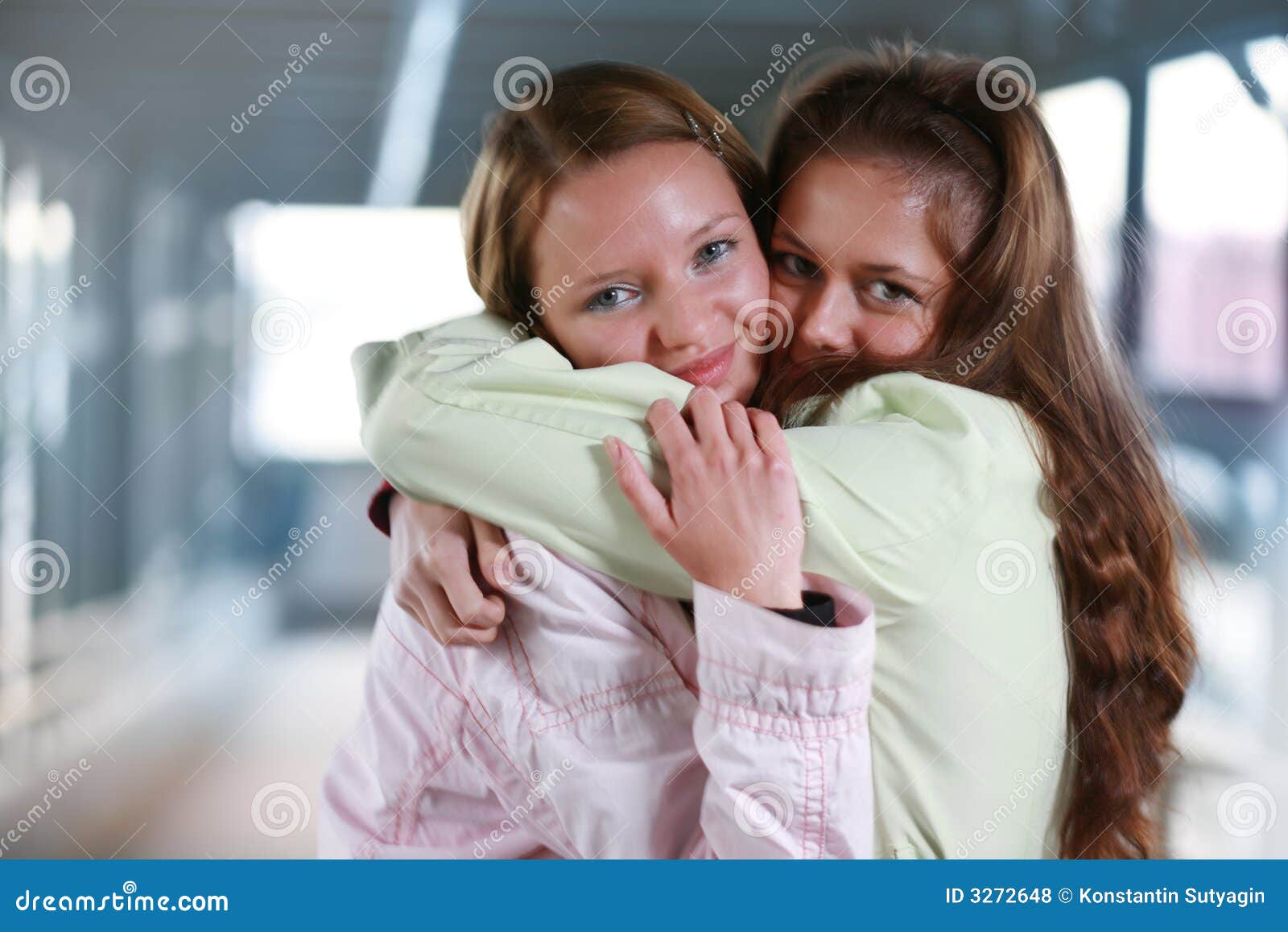 two girls hugging