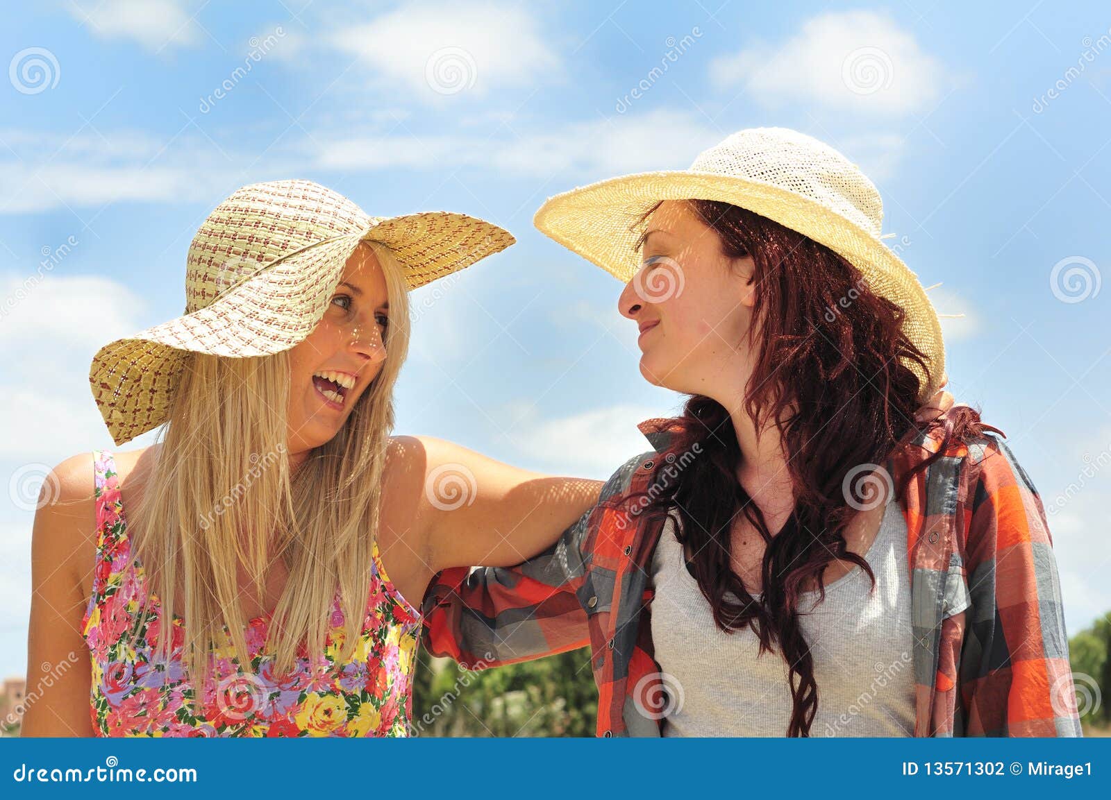 two girls laughing and joking
