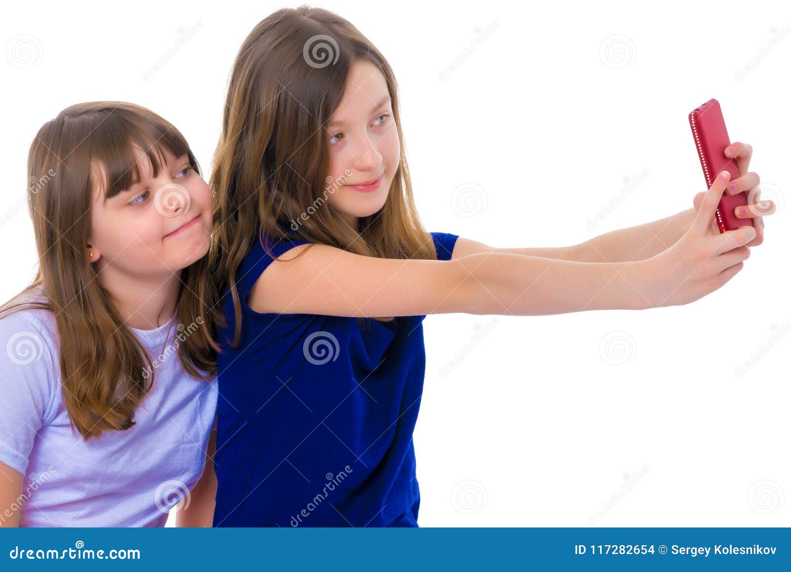 Two Girls Make a Self-portrait on a Smartphone. Stock Photo - Image of ...