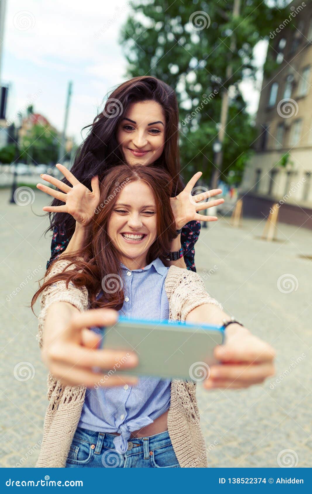 Two Girls Making Funny Selfie on the Street, Having Fun Together Stock  Photo - Image of modern, reddish: 138522374
