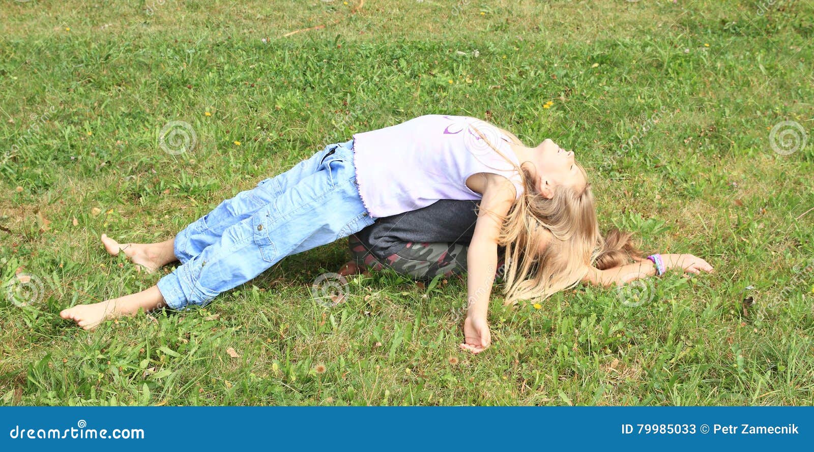 https://thumbs.dreamstime.com/z/two-girls-playing-lying-each-other-little-barefoot-kids-exercising-one-back-one-green-grass-79985033.jpg