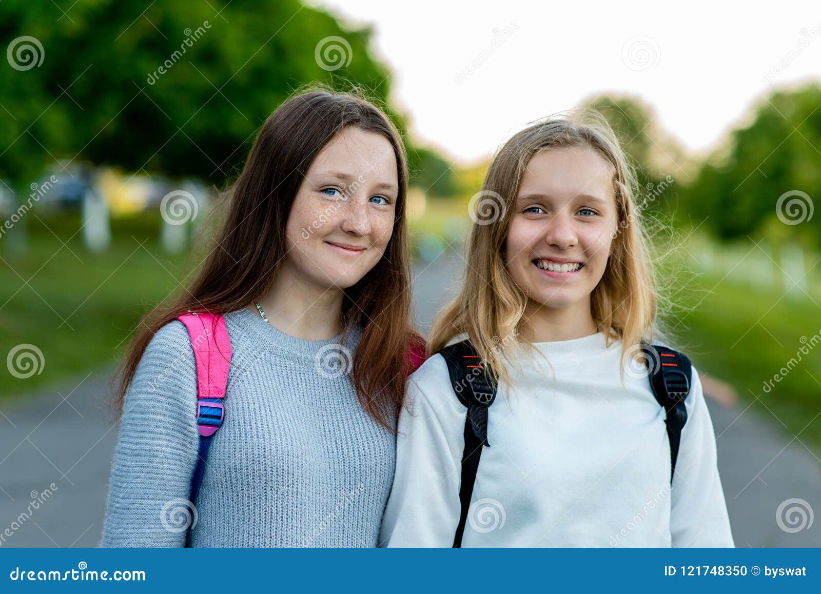 Two Girls Schoolgirl Summer In Nature They Hold Each Other`s Hands The Concept Best Friends 