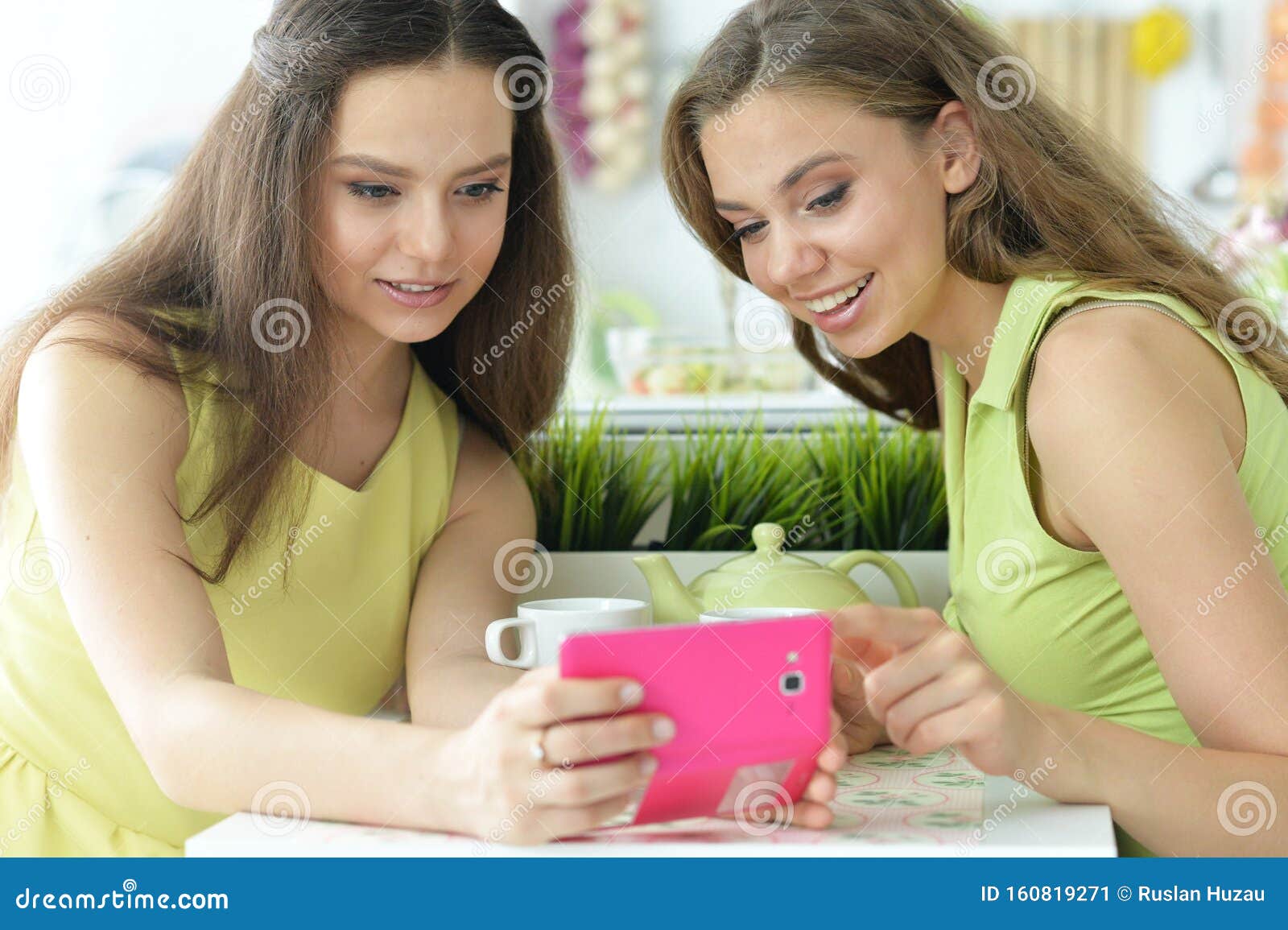 Close Up Portrait of Two Girls Sitting in Front of Laptop Stock Image ...