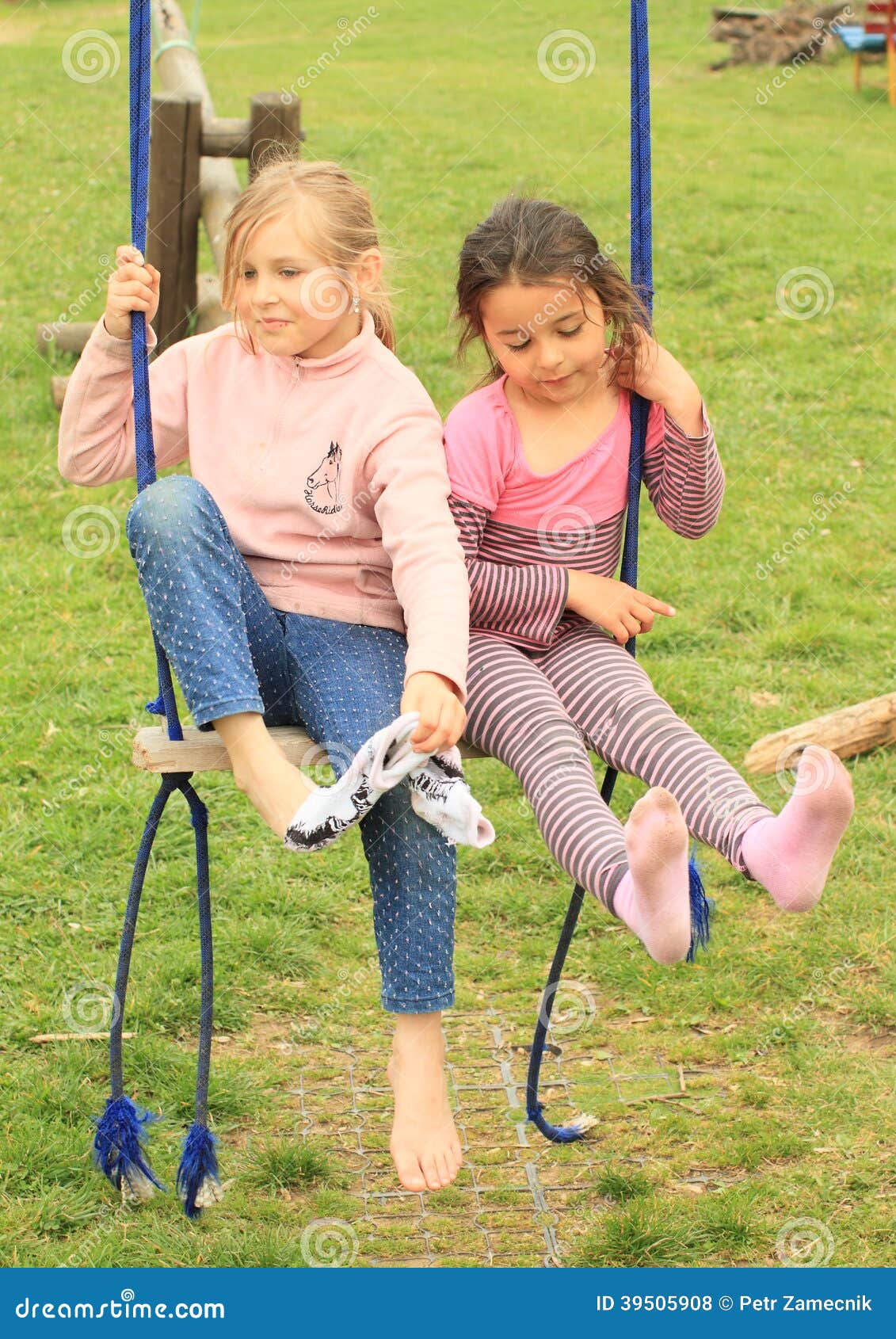 Two Kids - Boy And Girl - Taking Care Of Domestic Animals On Far ...