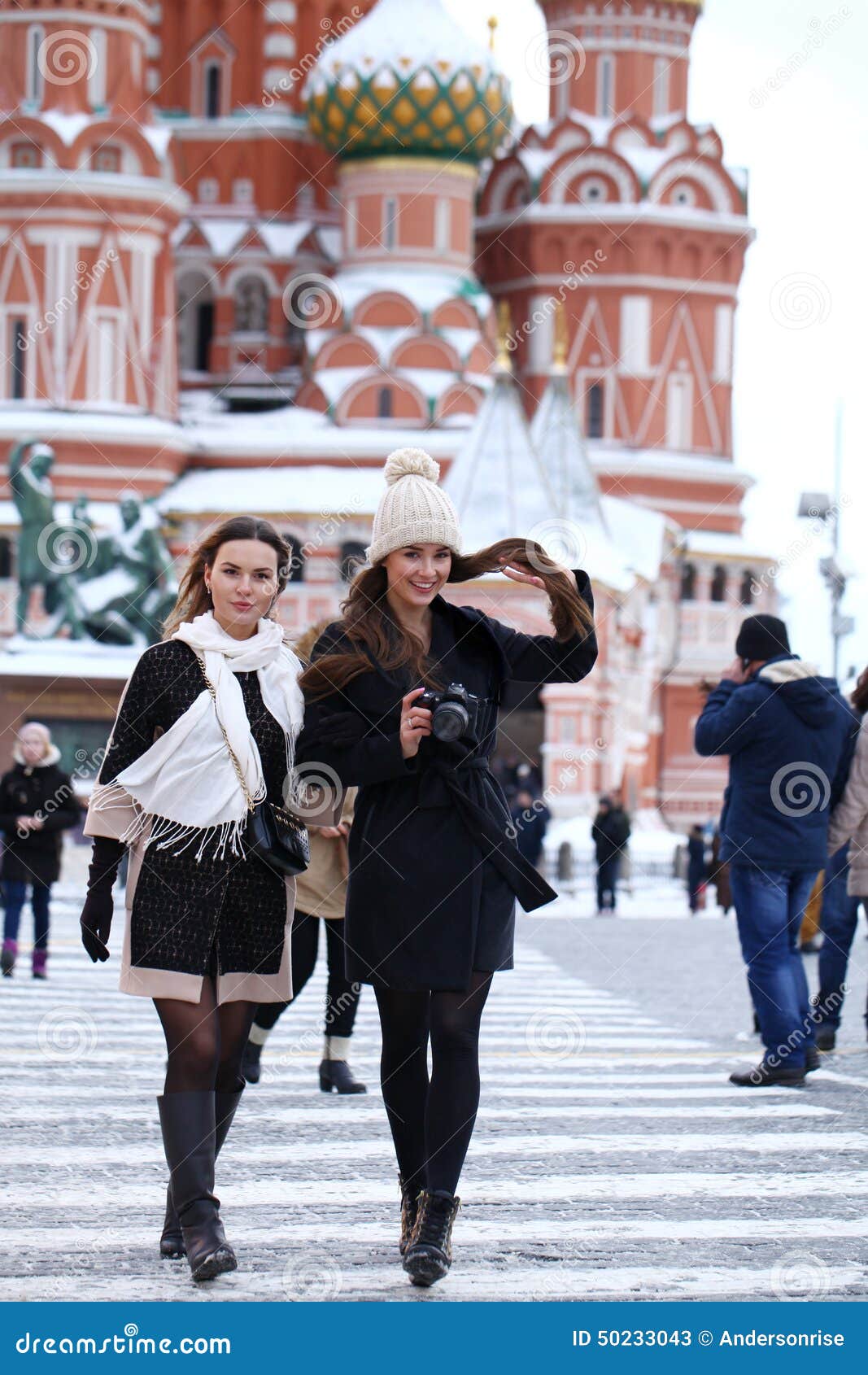 Two Girls Tourists Are Photographed In Moscow Russia Stock Image
