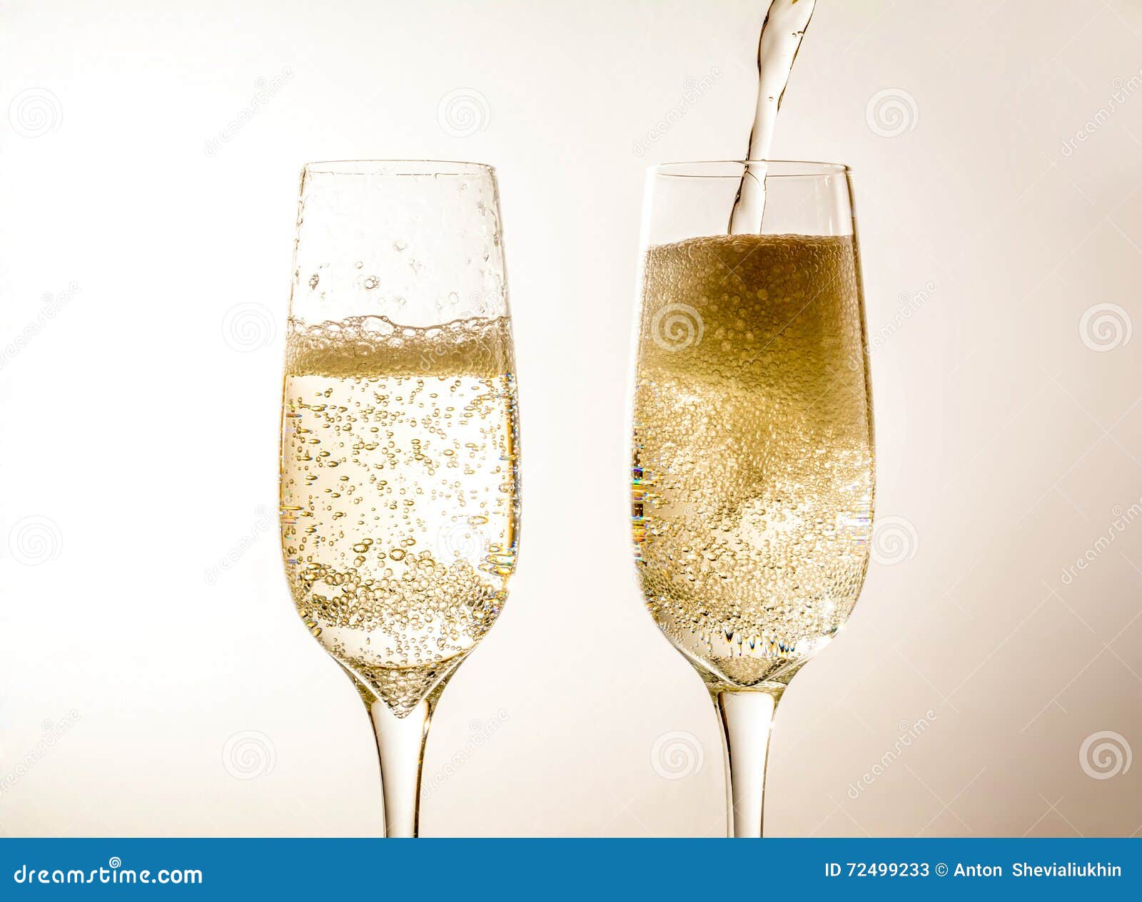 Two Glass Of Champagne Wine Close Up, Bubbles, On Grey Background Stock