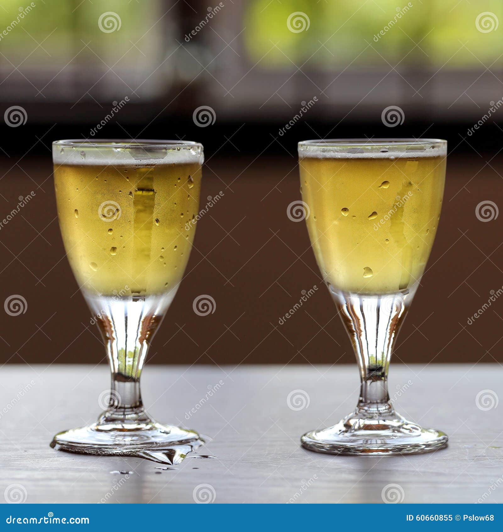 Two Glasses of Cold Beers stock image. Image of alcohol 60660855