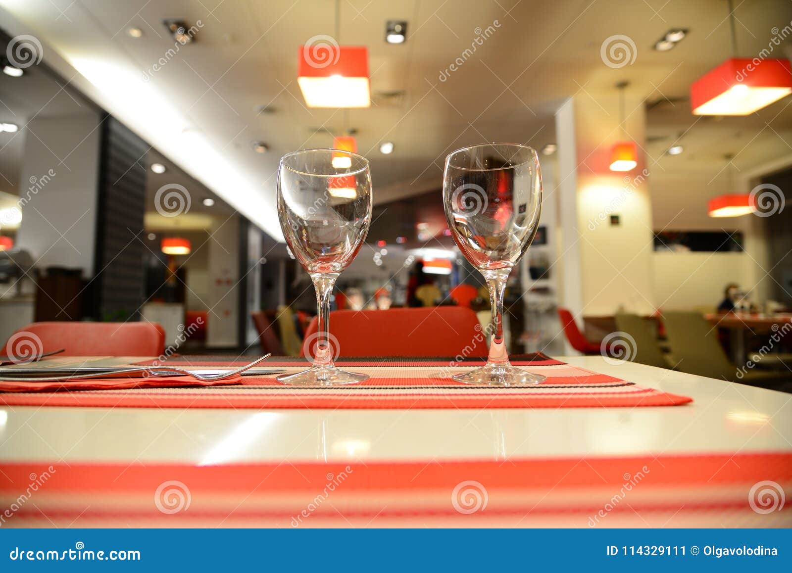 two glasses on table in a cafe