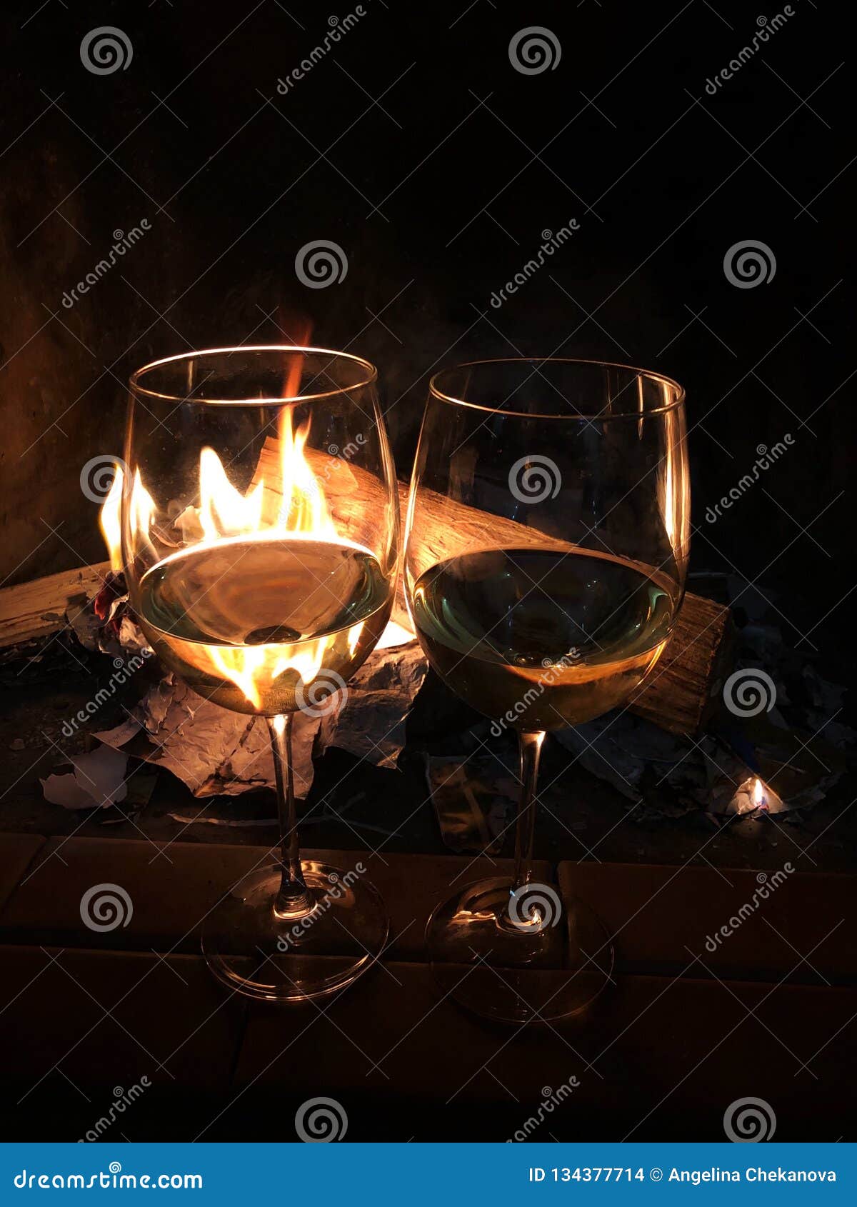 Two Glasses of White Wine by the Fireplace Stock Photo Image of