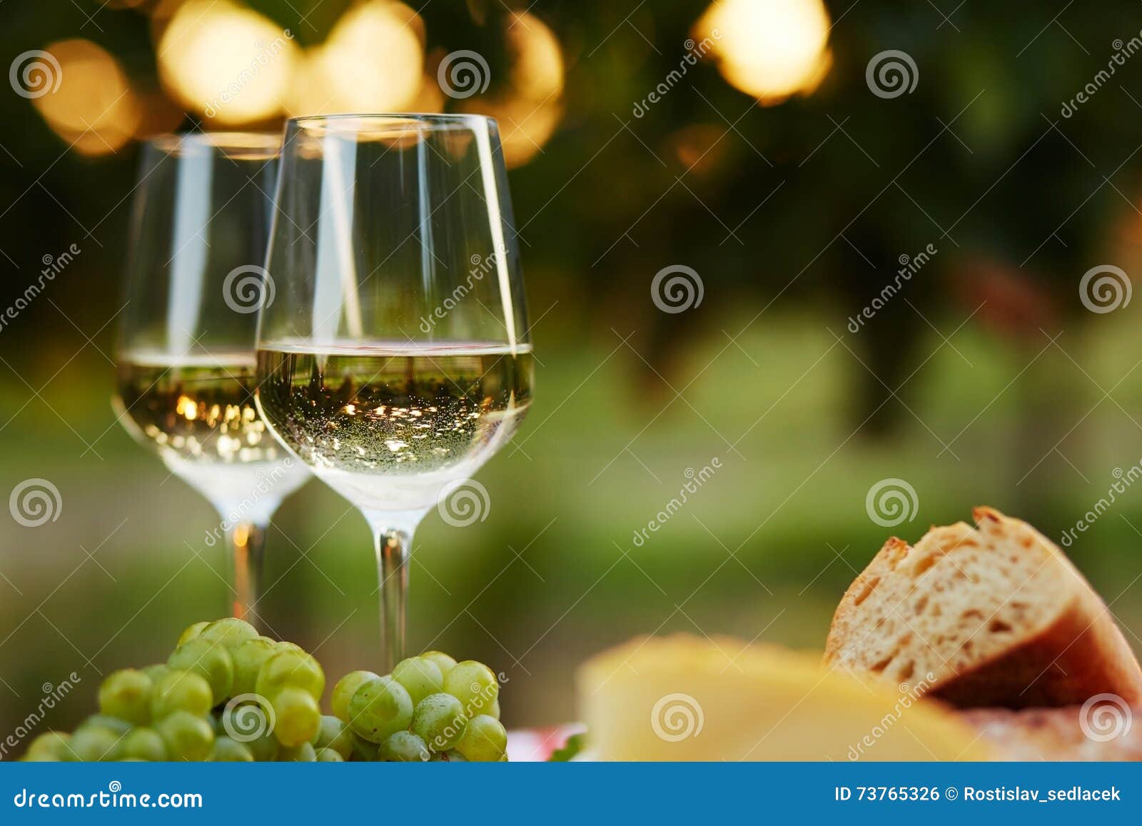 Two Glasses of White Wine with Food Stock Photo Image of table, life