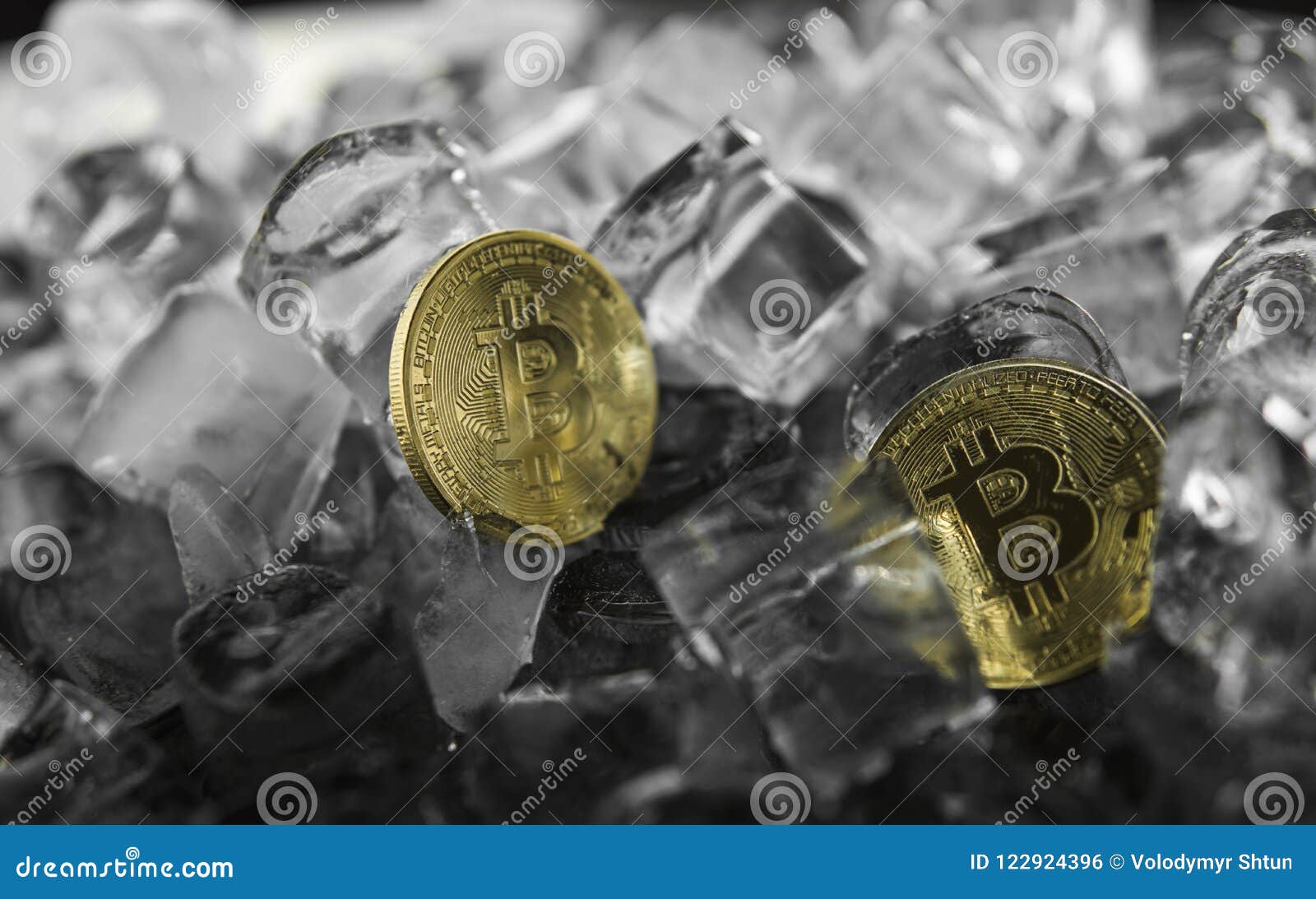 Two Gold Bitcoin On Ice Background. The Concept Of The ...