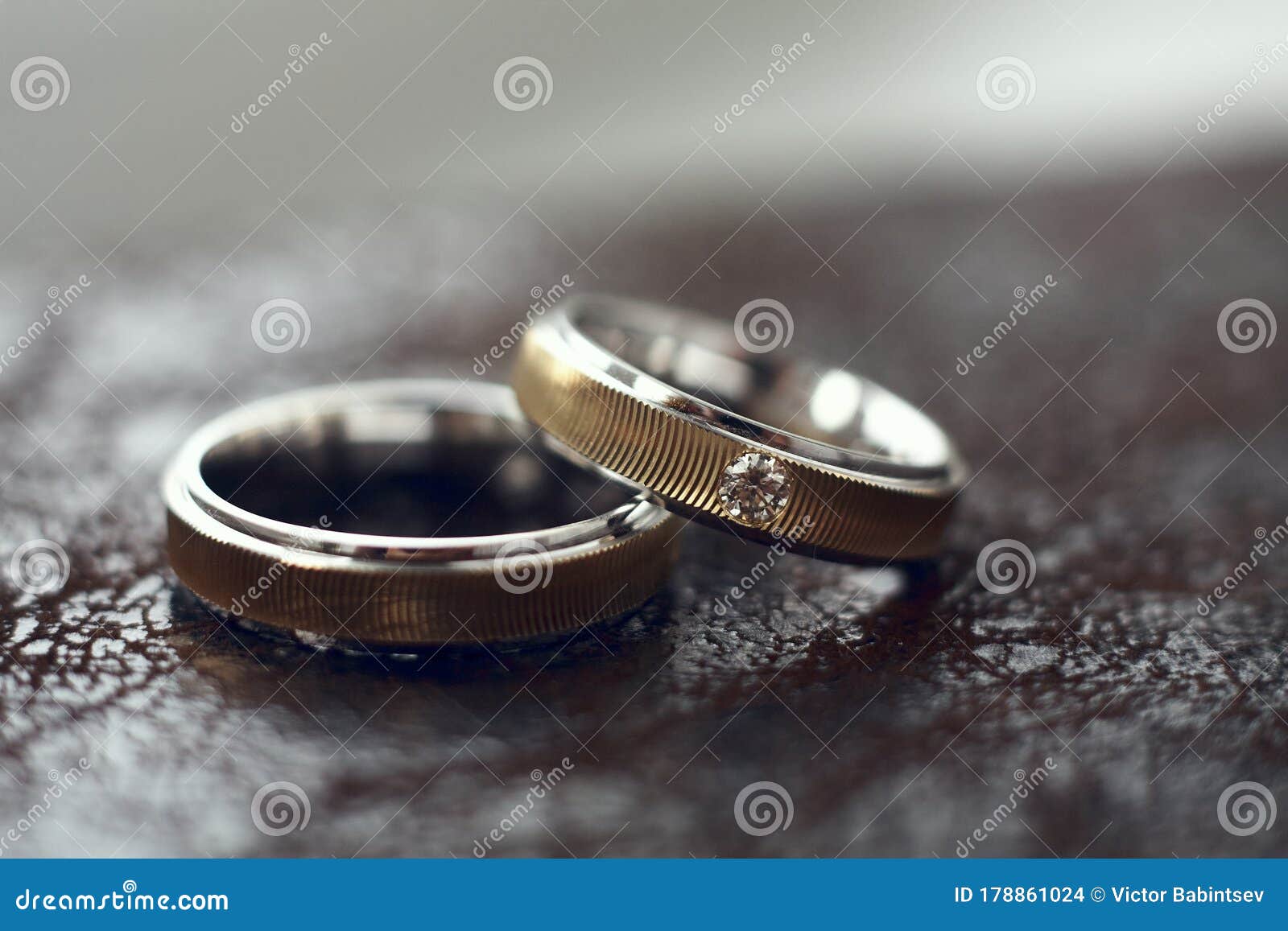 Two Gold Wedding Rings with One Diamond Stock Photo Image of diamond