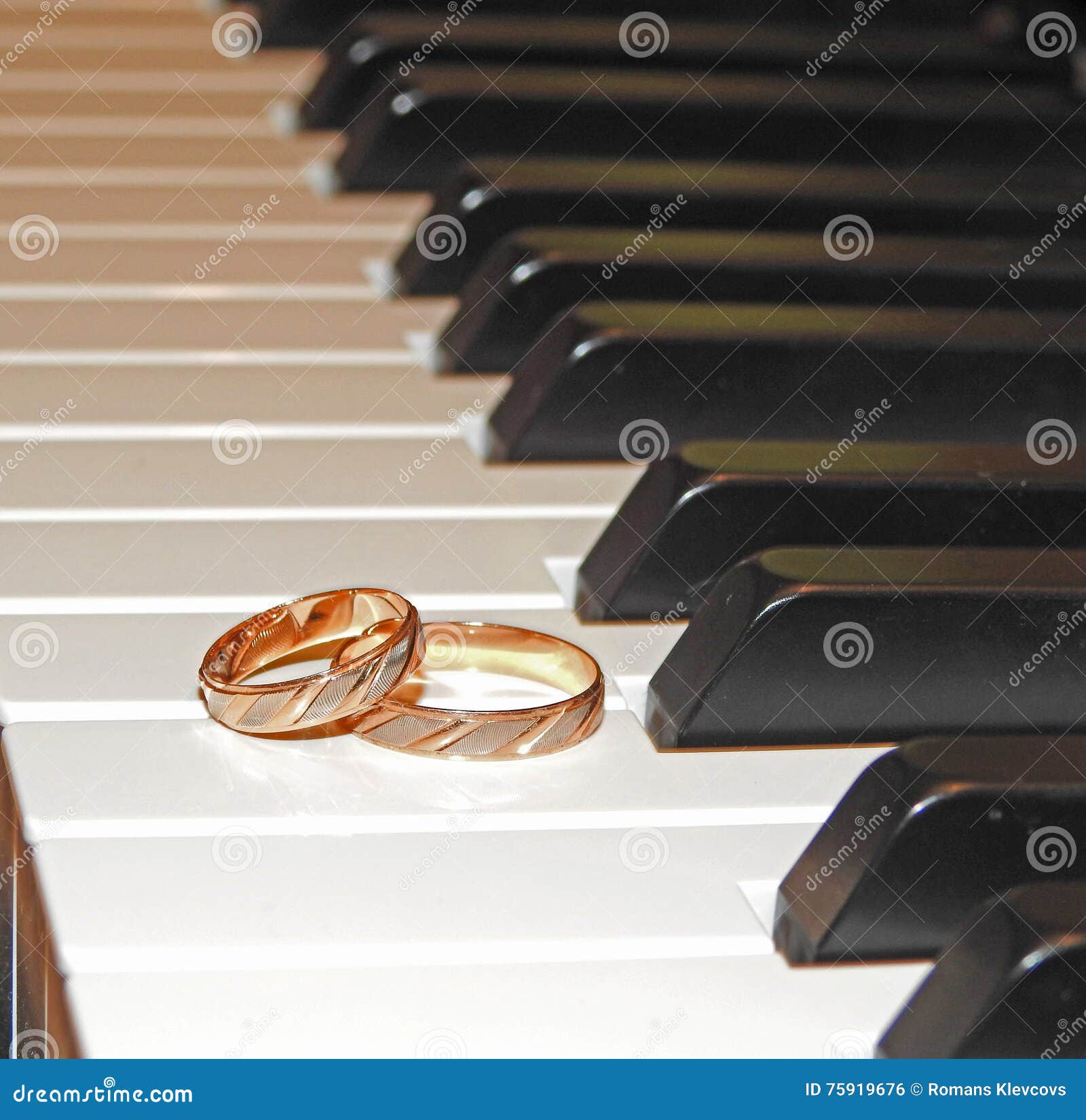 Two Gold Wedding Rings on Piano Stock Photo Image of black, eternity