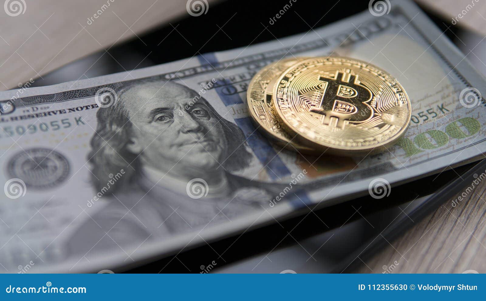 Two Golden Bitcoins On A Us Dollars And On The Tablet ...