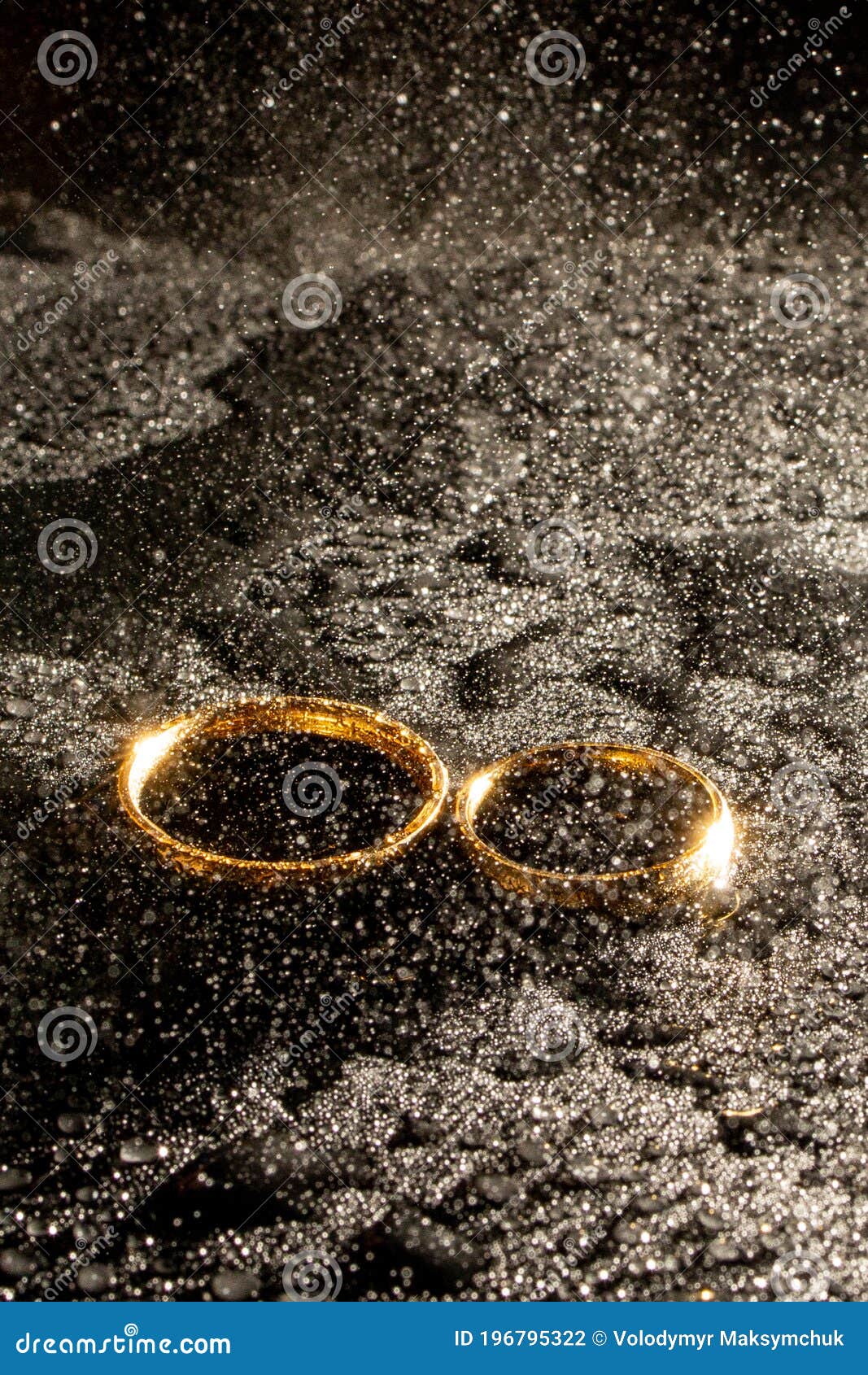 Two Golden Wedding Rings on Black Background Stock Photo Image of