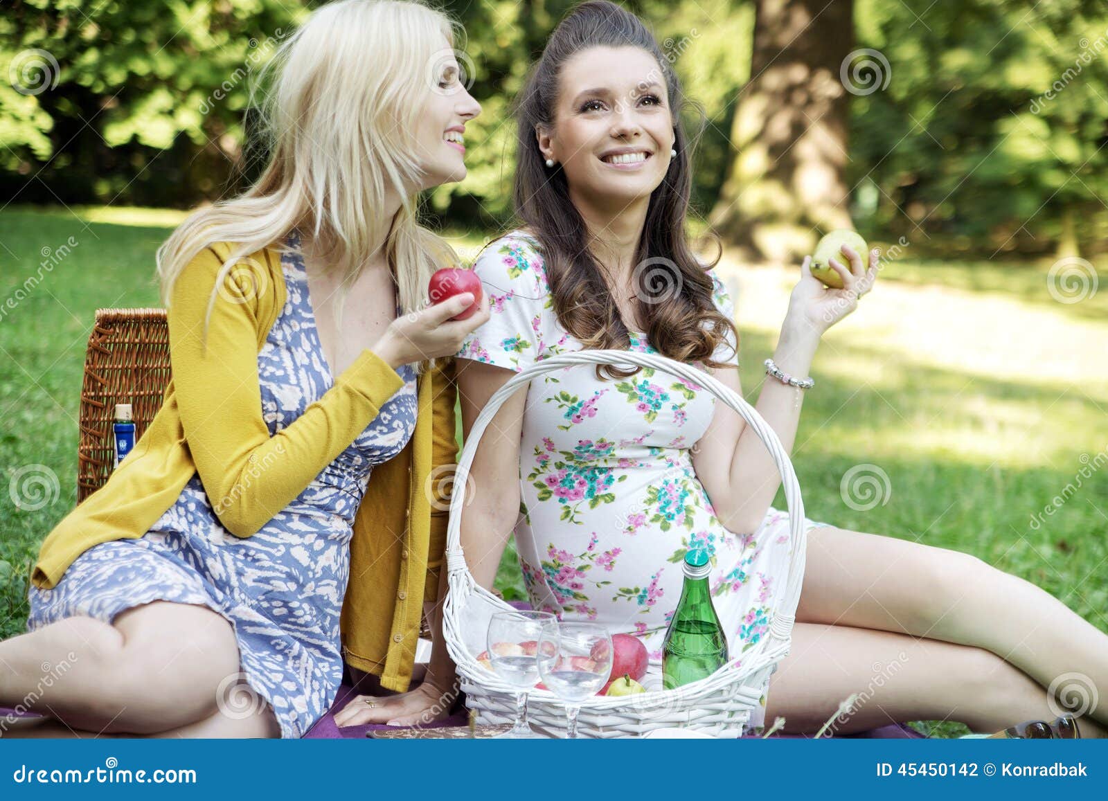 Two Girlfriends Sitting on the Blanket Stock Photo Image of
