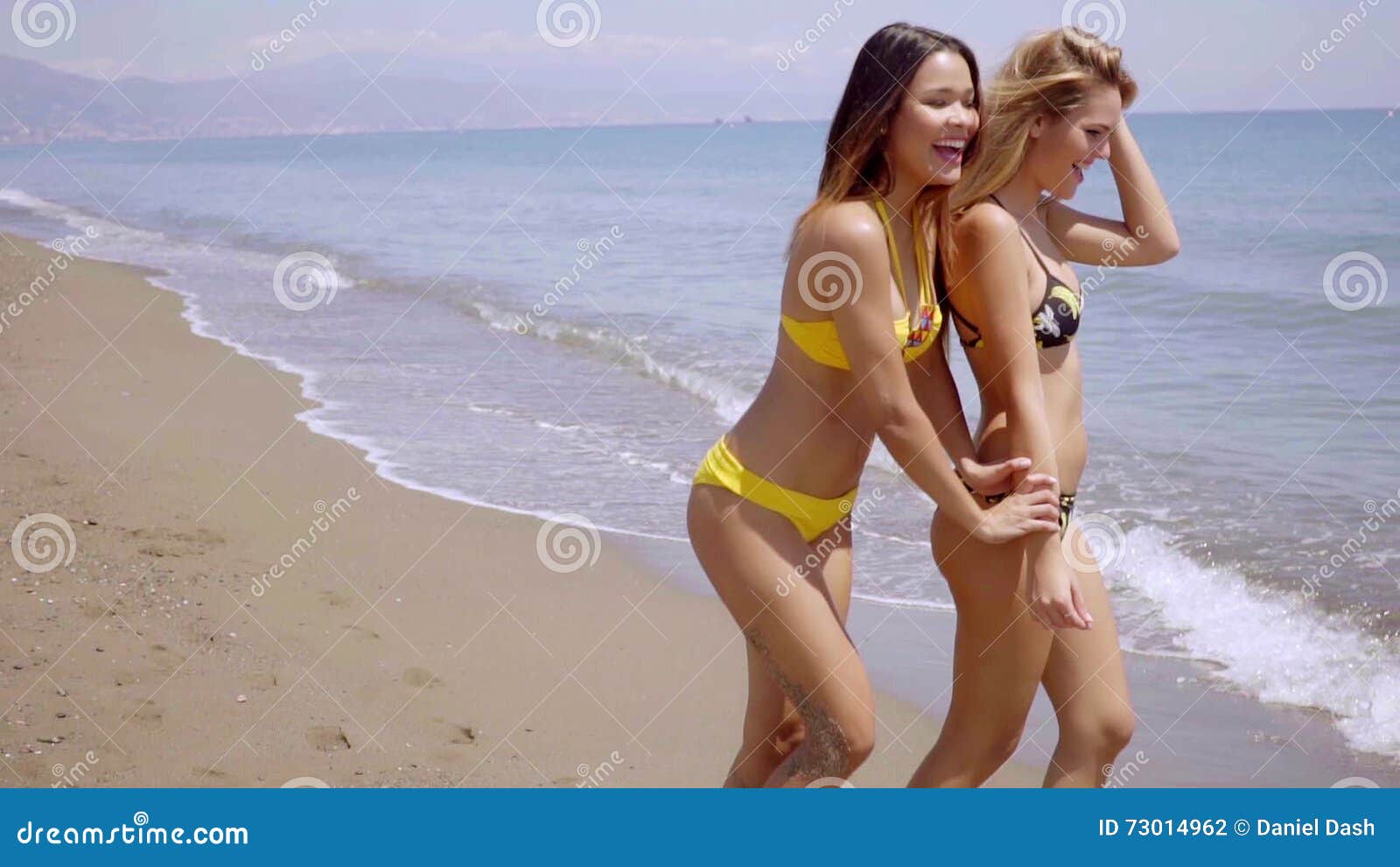 Two Gorgeous Young Women Wearing Bikinis, People Stock Footage ft. beach &  friends - Envato Elements