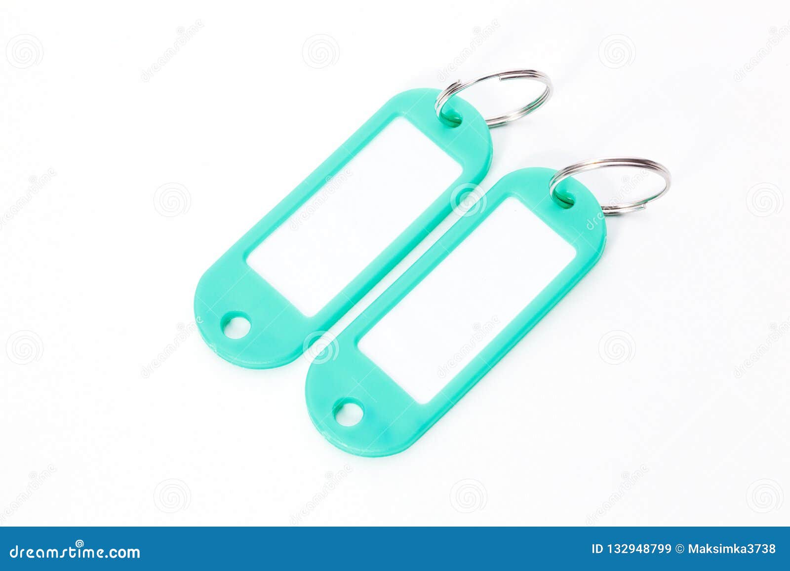 Two Green key fob. stock image. Image of chain, keyring 132948799