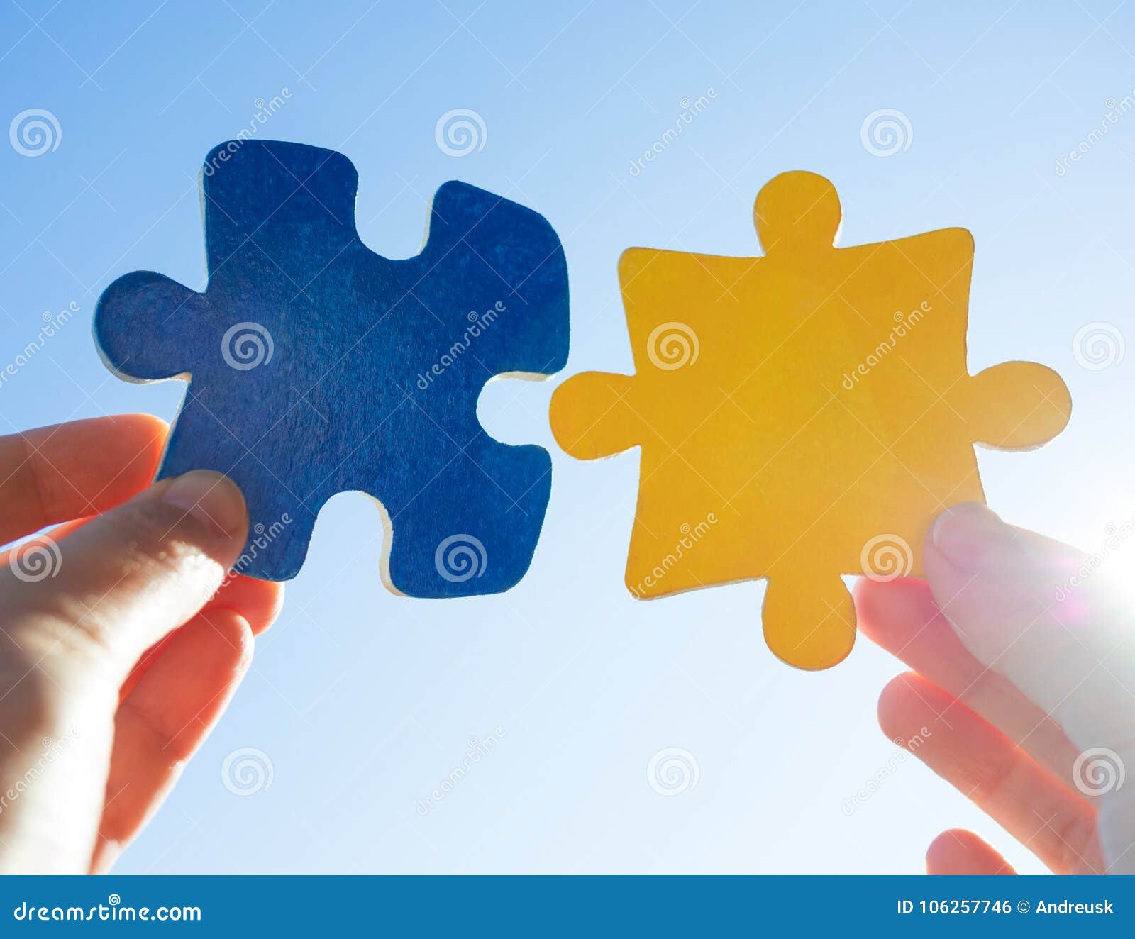 hands with puzzle pieces