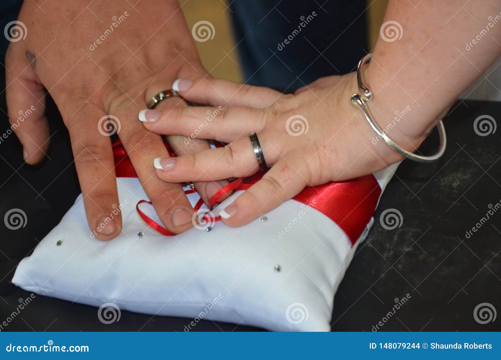 Two hands stock photo. Image of pillow, hands, married 148079244
