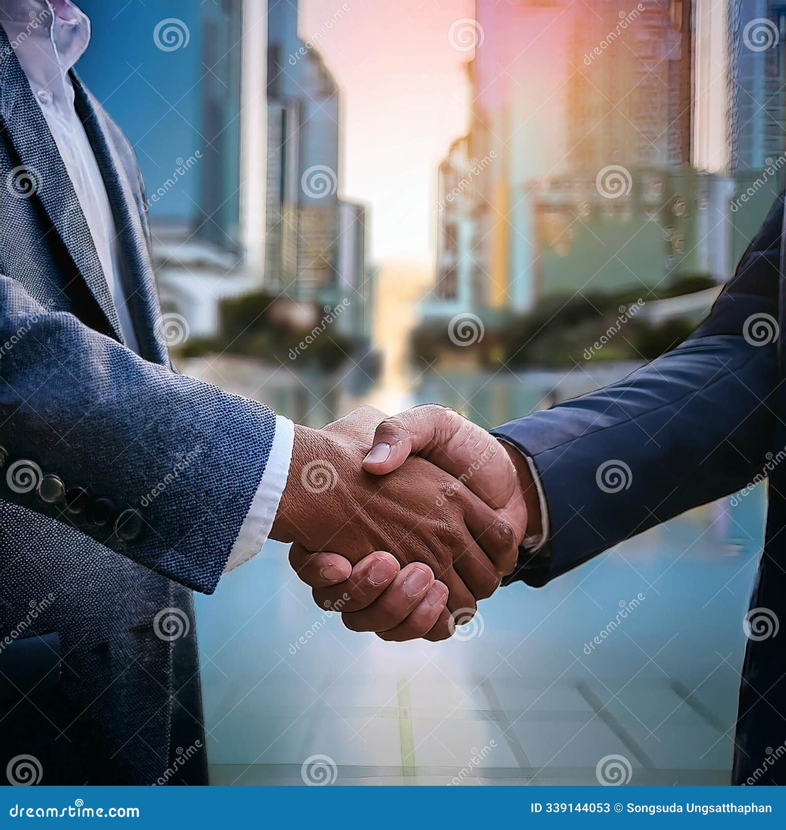 two hands shaking firmly, izing a business promise or agreement, business trust city background