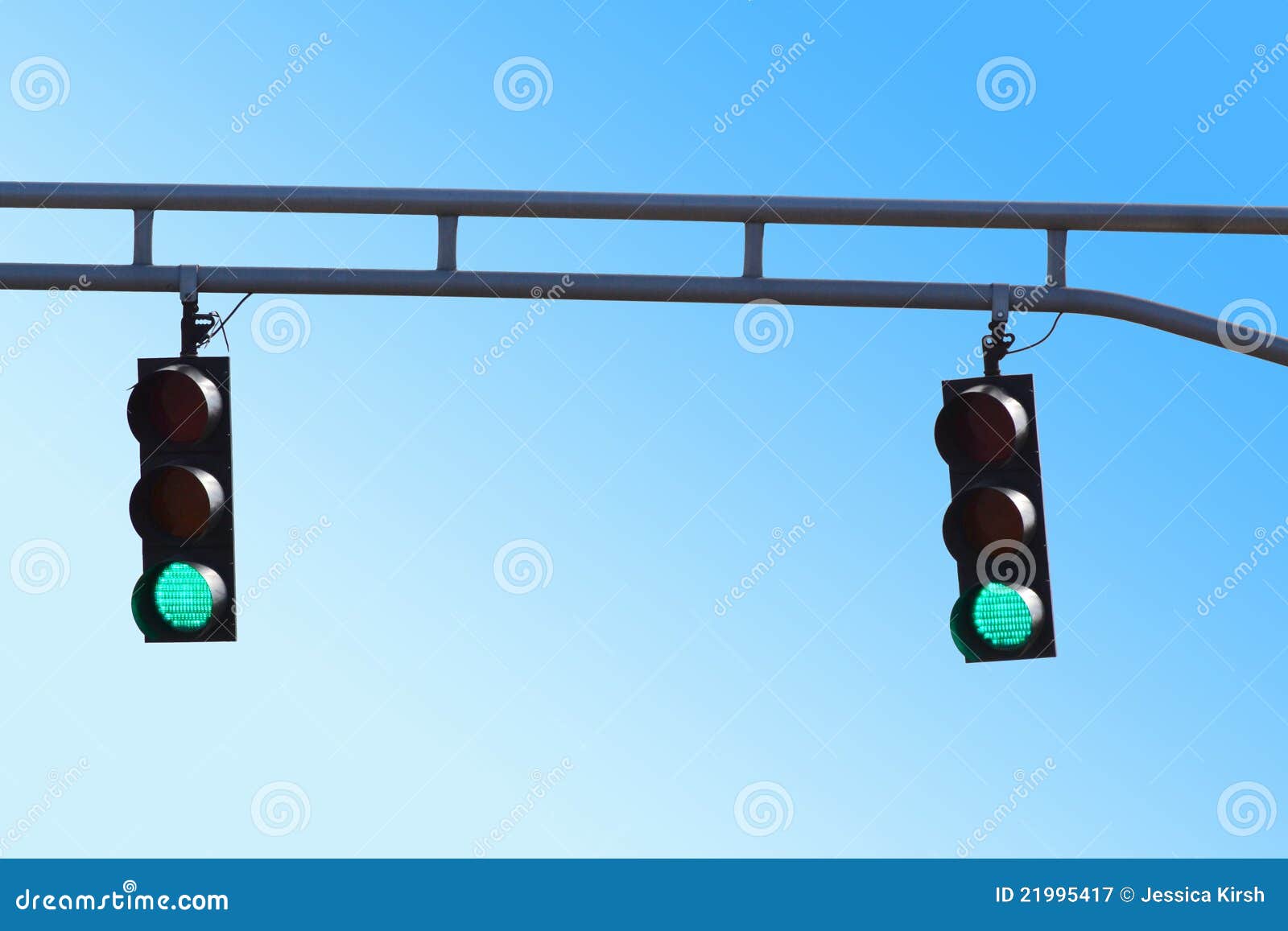 Pil sådan Byg op Two Hanging Traffic Signals with Green Lights Stock Image - Image of  county, communicate: 21995417