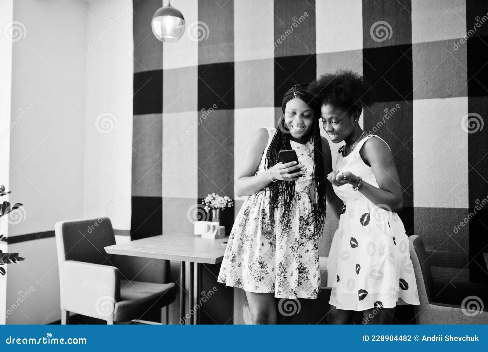 Two Black African Girlfriends at Summer Dresses Posed at Caf