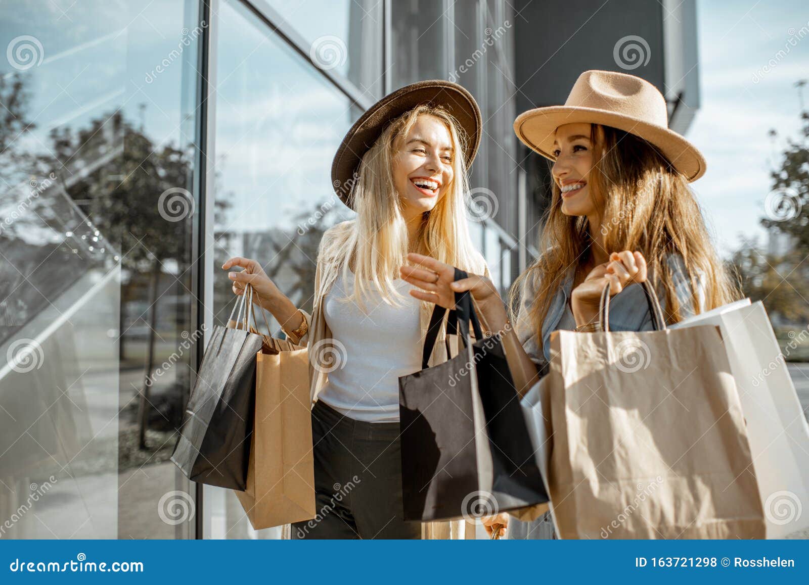 Women with Shopping Bags Near the Shopwindow Stock Photo - Image of ...