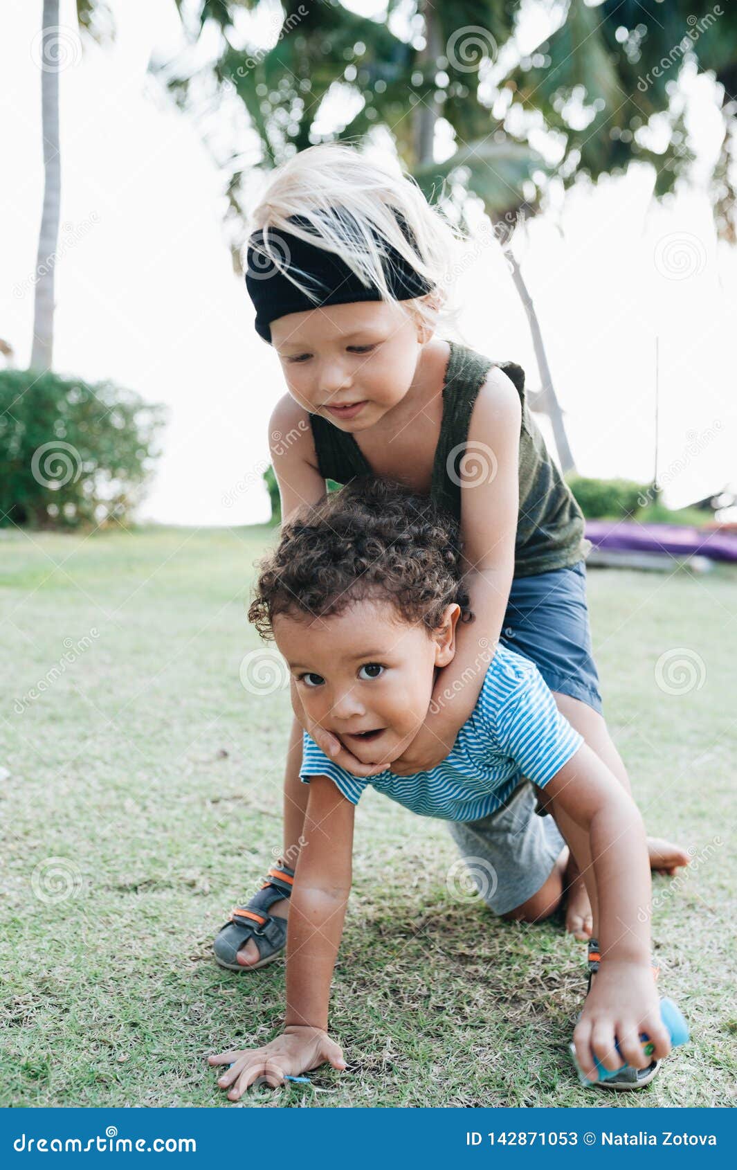 young boys hugging