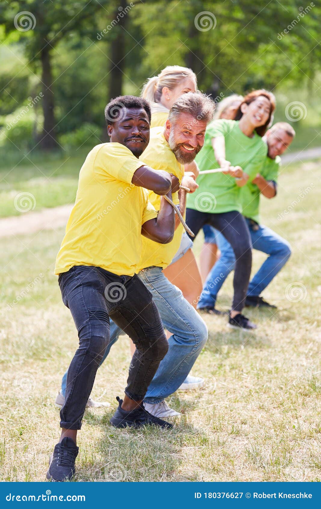 Two Happy Teams in Tug-of-war with Rope Stock Image - Image of ...
