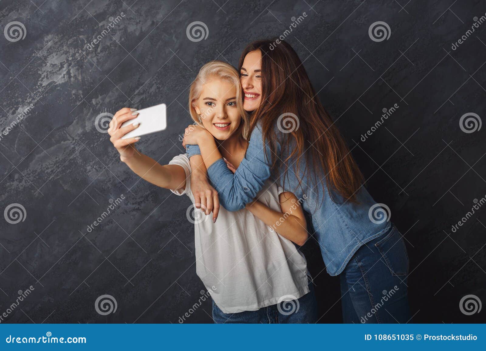 Two Happy Women Taking Selfie at Studio Background Stock Image - Image ...