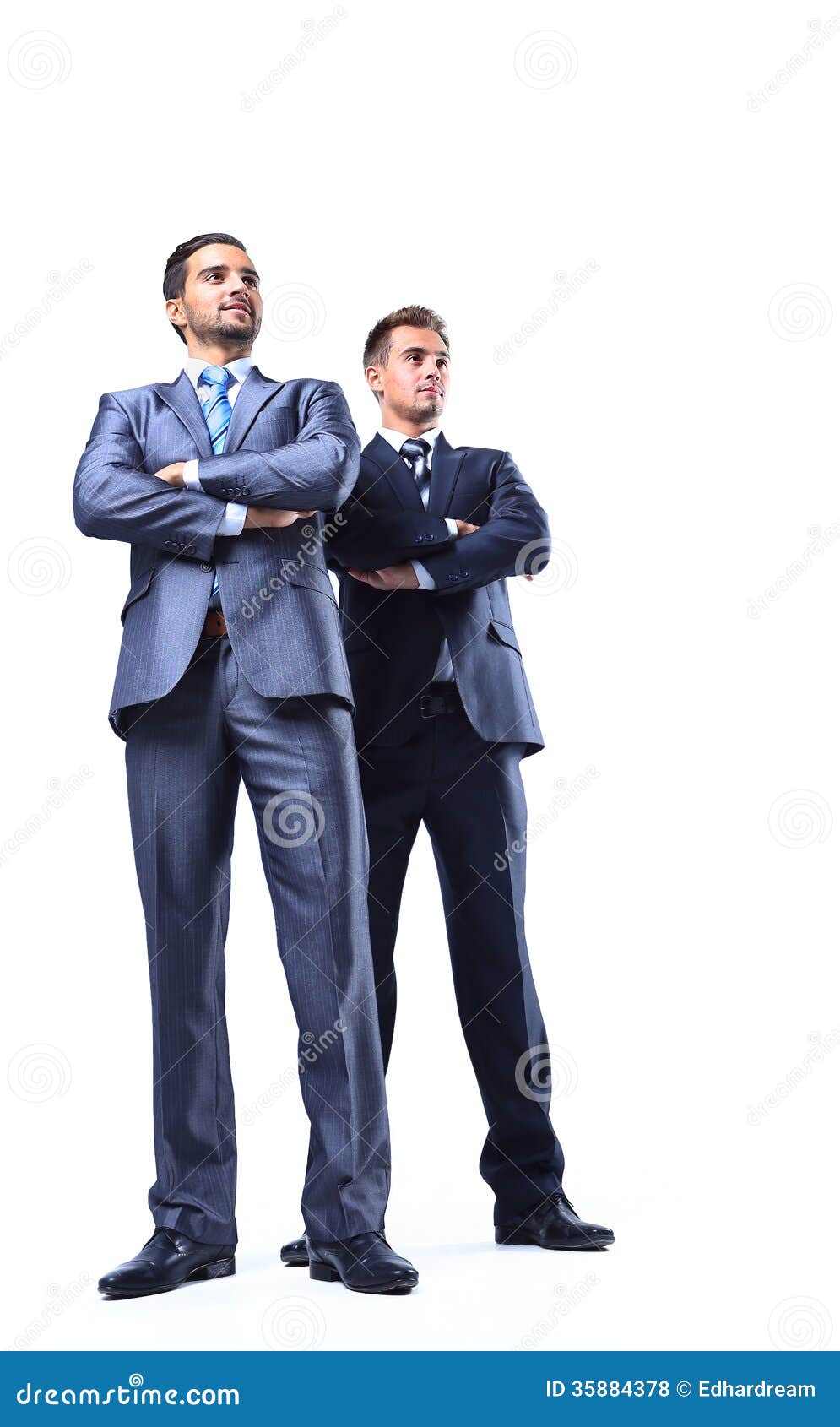 two happy young businessmen full body
