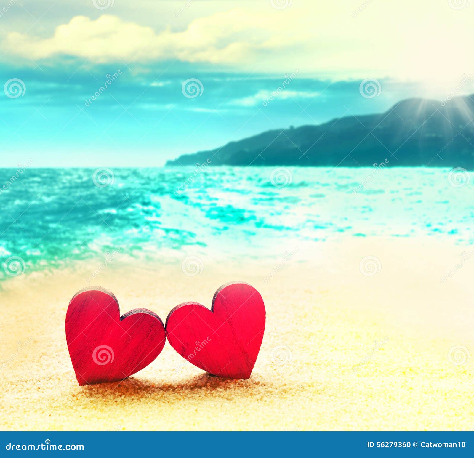 Two hearts on the beach stock photo. Image of sunset 56279360