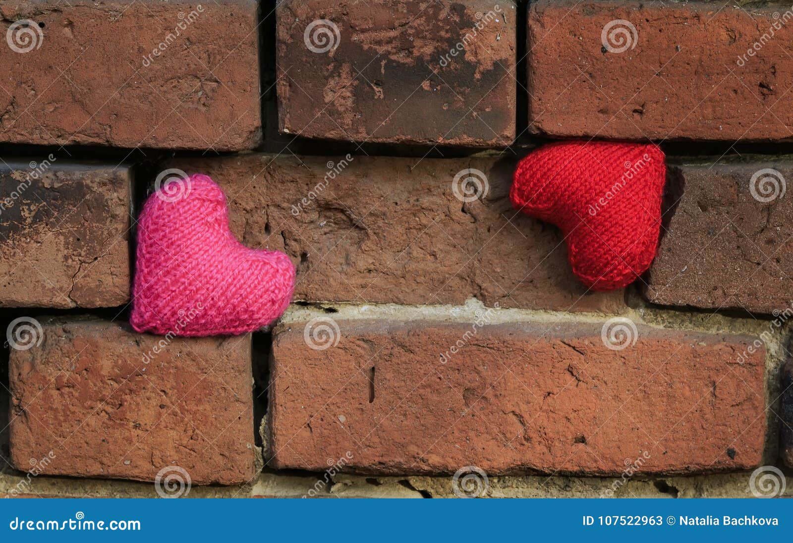 Two Hearts in Red and Pink Hanging on a Crumbling Old Textured B Stock ...